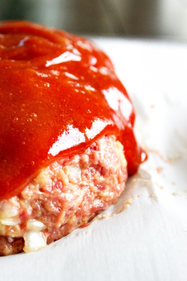 BROWN SUGAR MEATLOAF - Covered with a sweet brown sugar glaze this meatloaf full of flavor, it's the best meatloaf you will ever have. Grab a fork & dig in. meatloaf topped with the glaze.