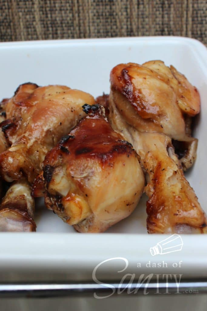 3 Honey Soy Baked Chicken Drumsticks in a white dish