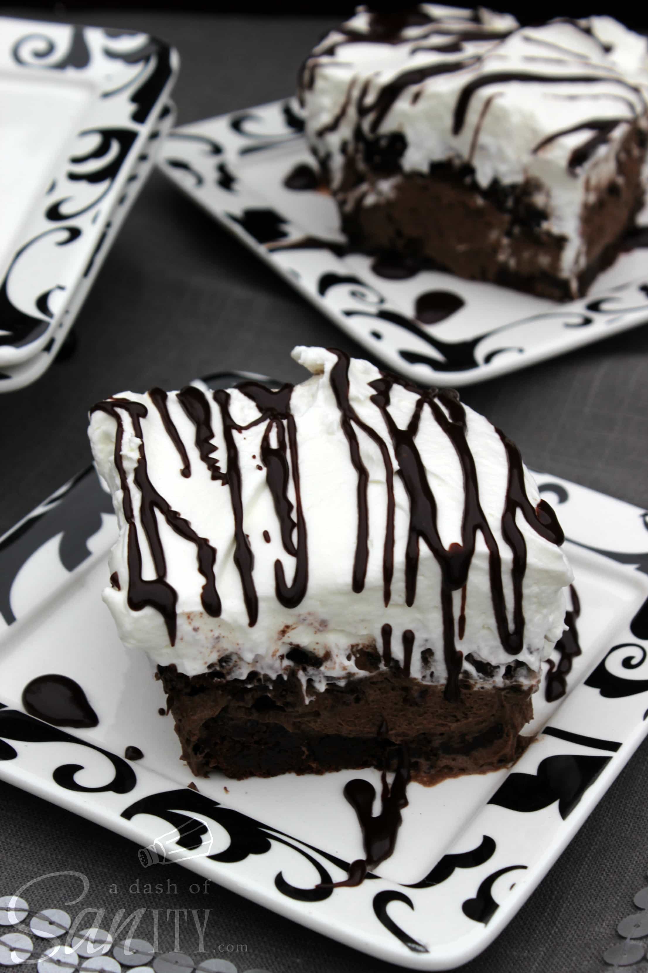 Chocolate Amore Dessert slices served on small square dessert plates