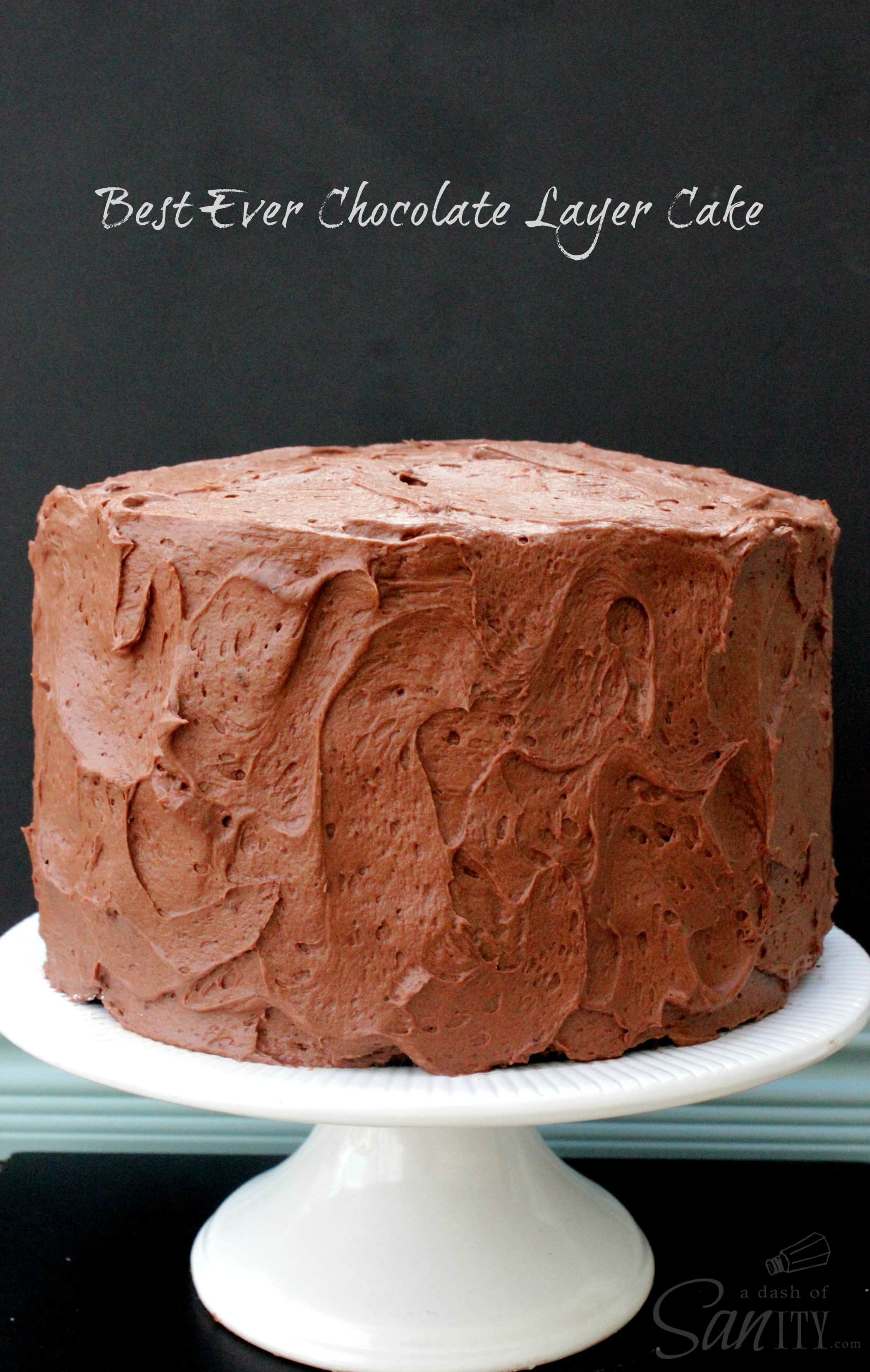 Best Ever Chocolate Layer Cake on a white cake stand