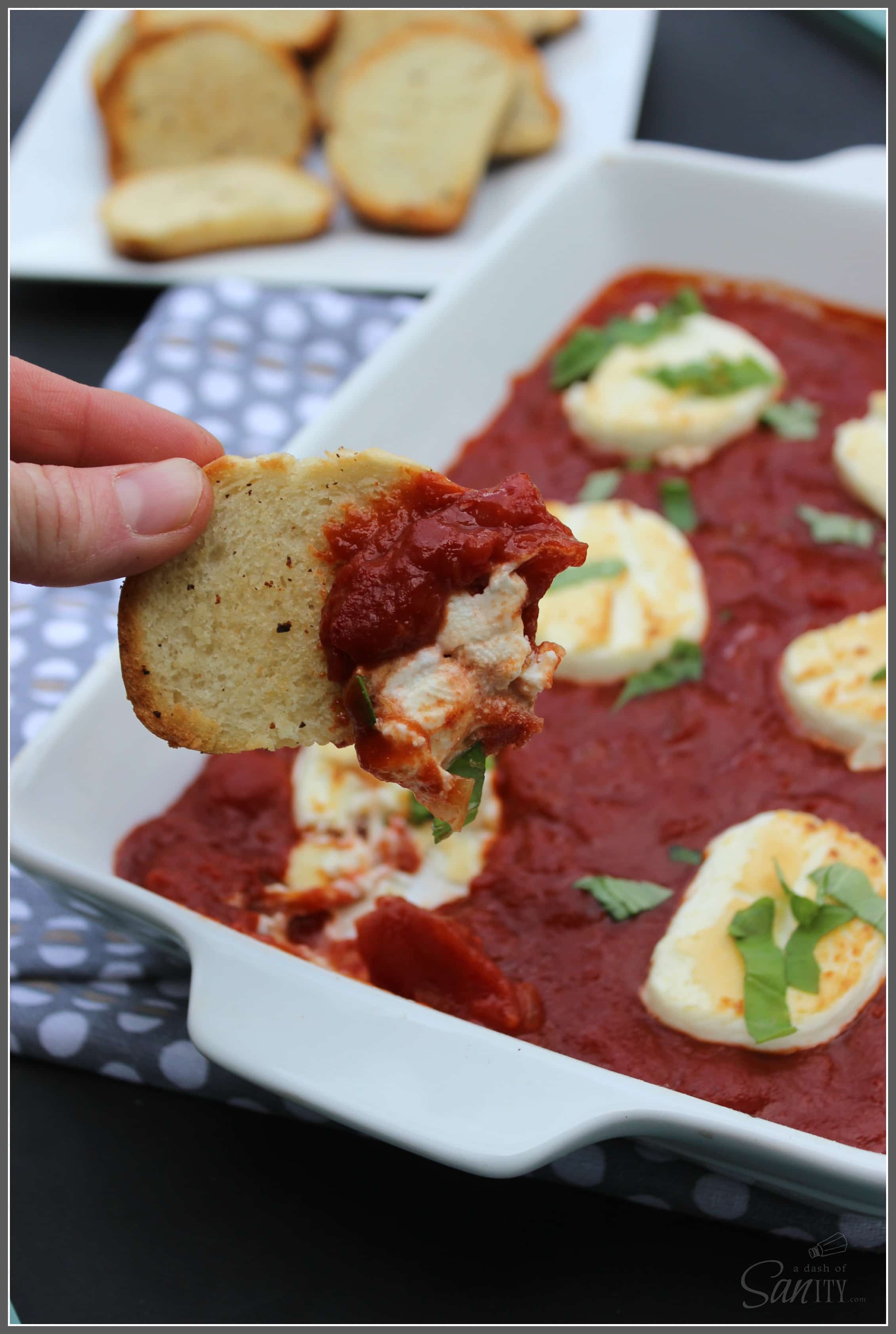 Baked Goat Cheese and Marinara is a simple, subtle sauce with tomatoes, onion, garlic, and basil, letting the goat cheese be the star of this dish. Baked Goat Cheese and Marinara is a simple, subtle sauce with tomatoes, onion, garlic, and basil, letting the goat cheese be the star of this dish.