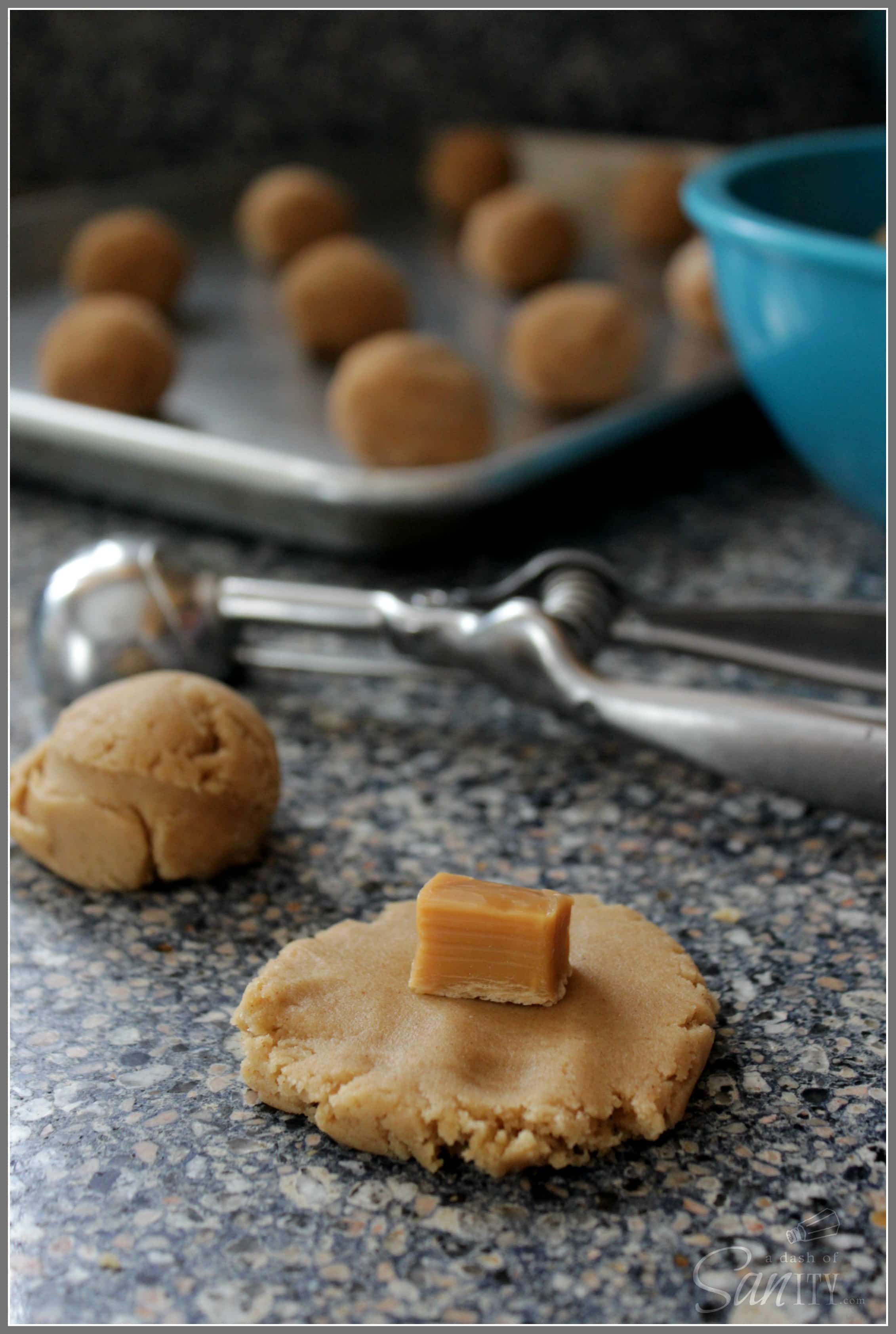Salted Caramel & Brown Butter Snickerdoodles are addictive cookies with a gooey caramel center, a dash of sea salt, and garnished with cinnamon sugar.