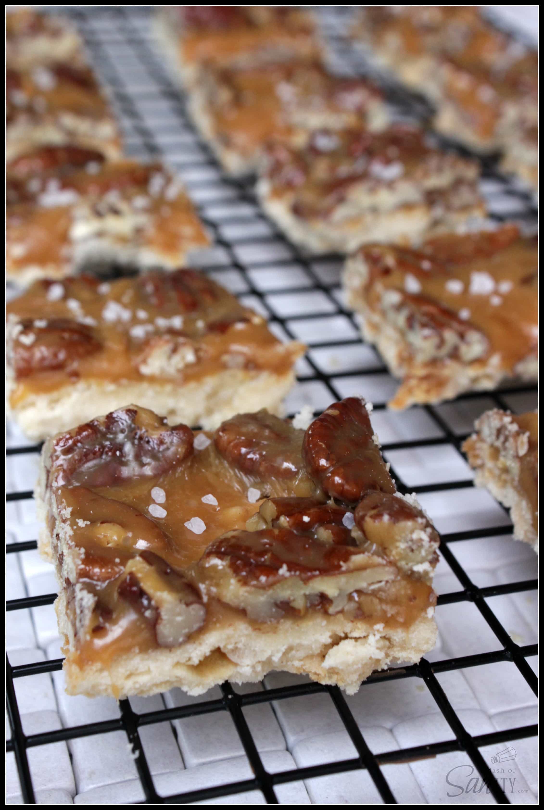 Caramel Pecan Shortbread Bars is a simple, sweet, and salty dessert. With caramel, pecans, and shortbread underneath, it is a candy bar in the making. Caramel Pecan Shortbread Bars is a simple, sweet, and salty dessert. With caramel, pecans, and shortbread underneath, it is a candy bar in the making.