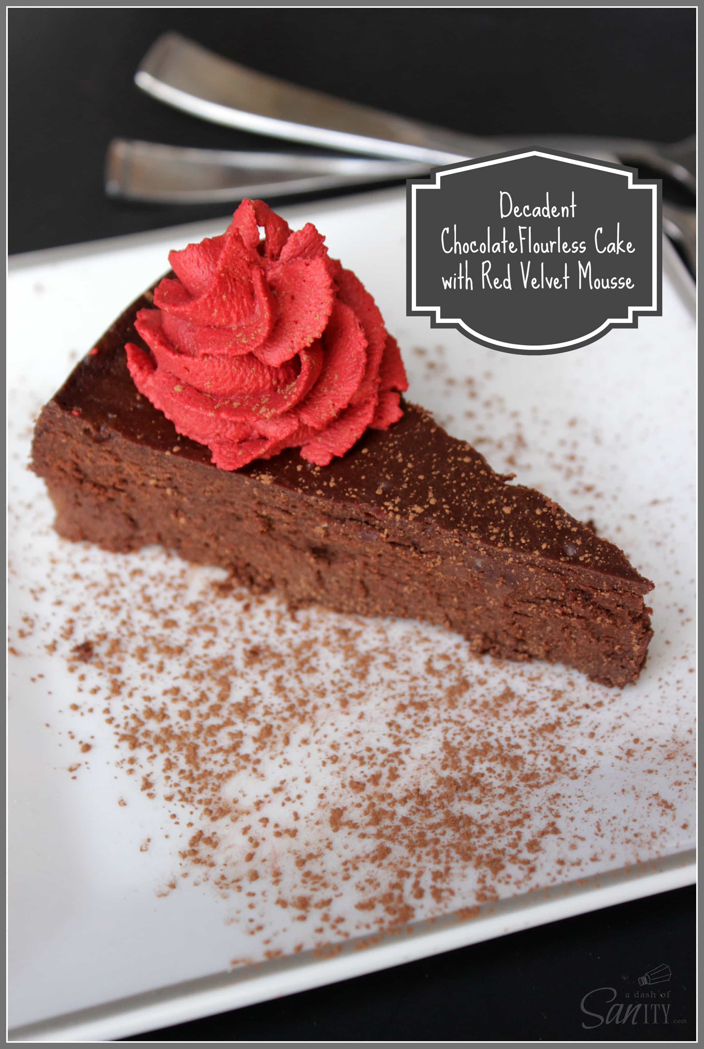 Decadent Chocolate Flourless Cake with Red Velvet Mousse slice on a plate with cocoa powder dusting