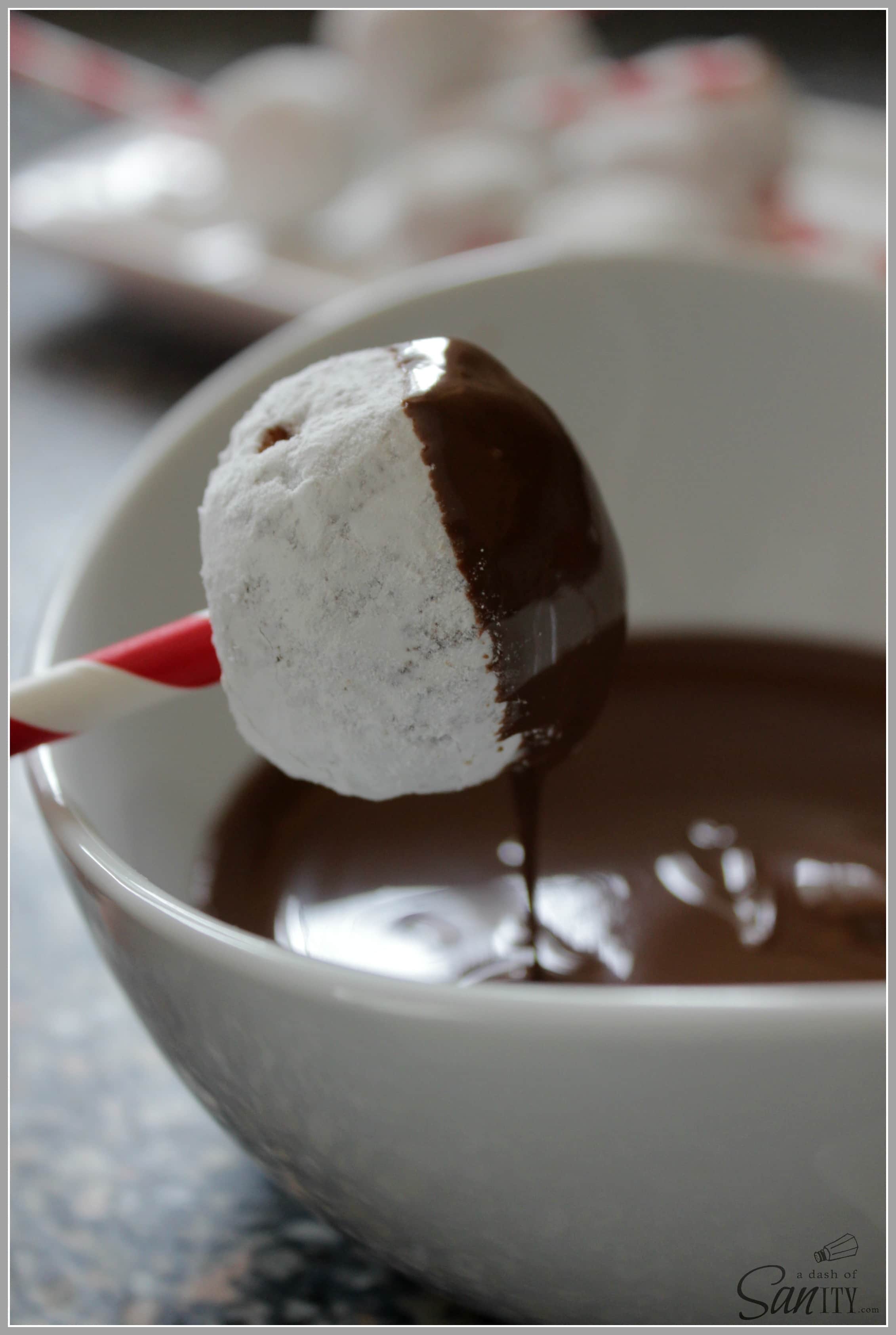 These Chocolate Dipped Donut Pops are a super fun and easy snack or treat that your kids will love to help make and devour!