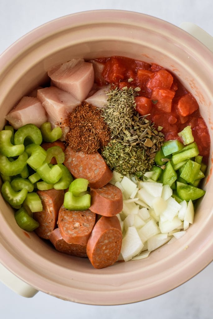 overhead photo of the raw ingredients in a slow cooker