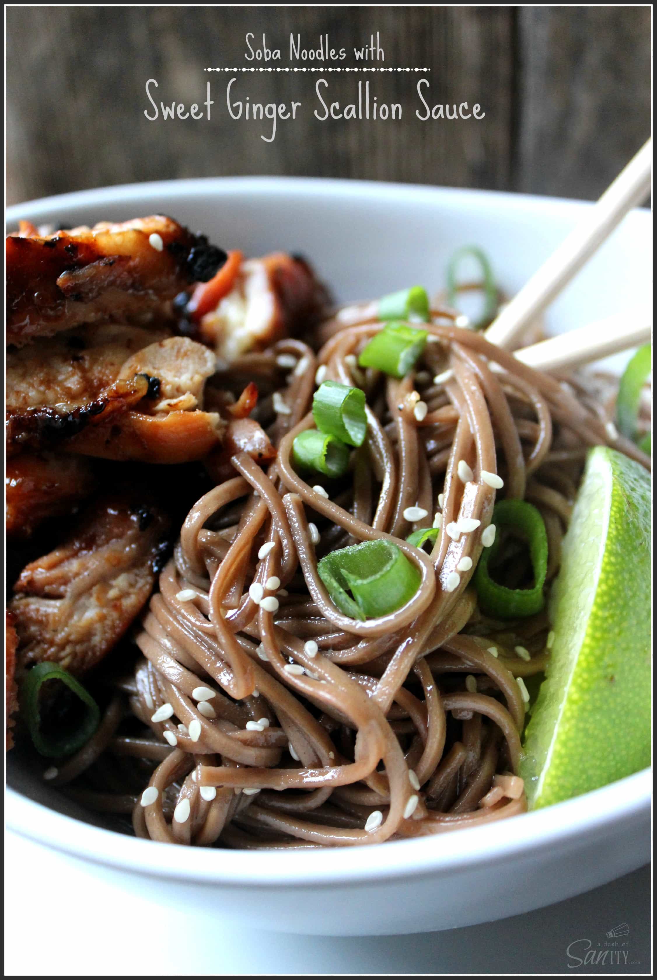 Soba Noodles with Sweet Ginger Scallion Sauce served with chopsticks and a lime slice in a bowl