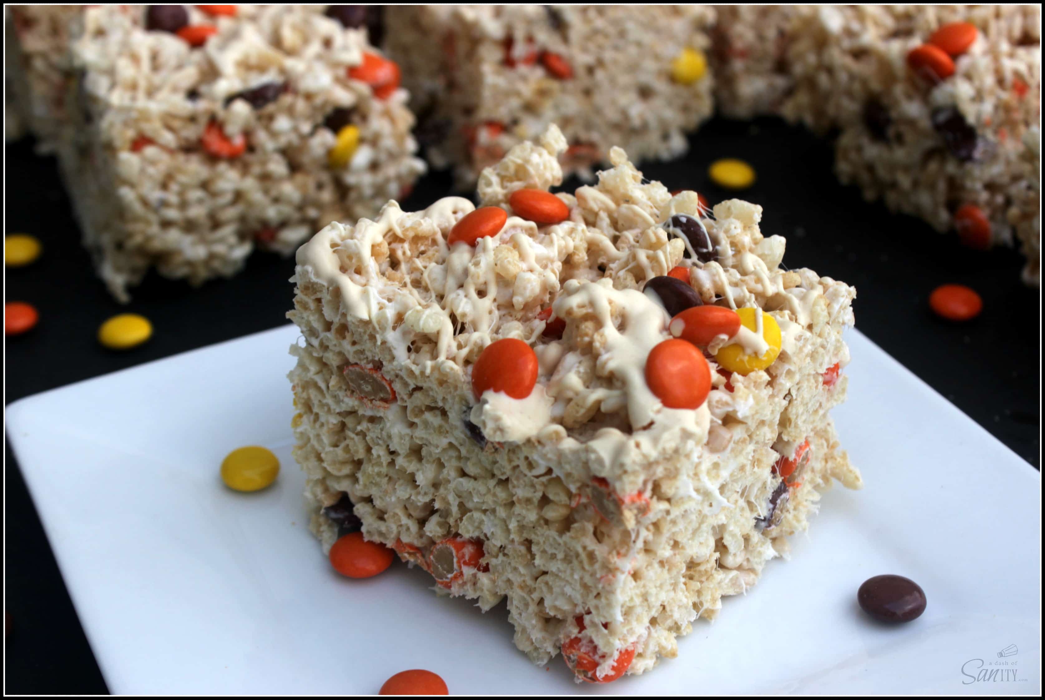 White Chocolate Reese's Pieces Rice Krispies Treats - white chocolate, Reese’s Pieces, and a gooey marshmallow treat melded into one of the finest snacks. White Chocolate Reese's Pieces Rice Krispies Treats - white chocolate, Reese’s Pieces, and a gooey marshmallow treat melded into one of the finest snacks.