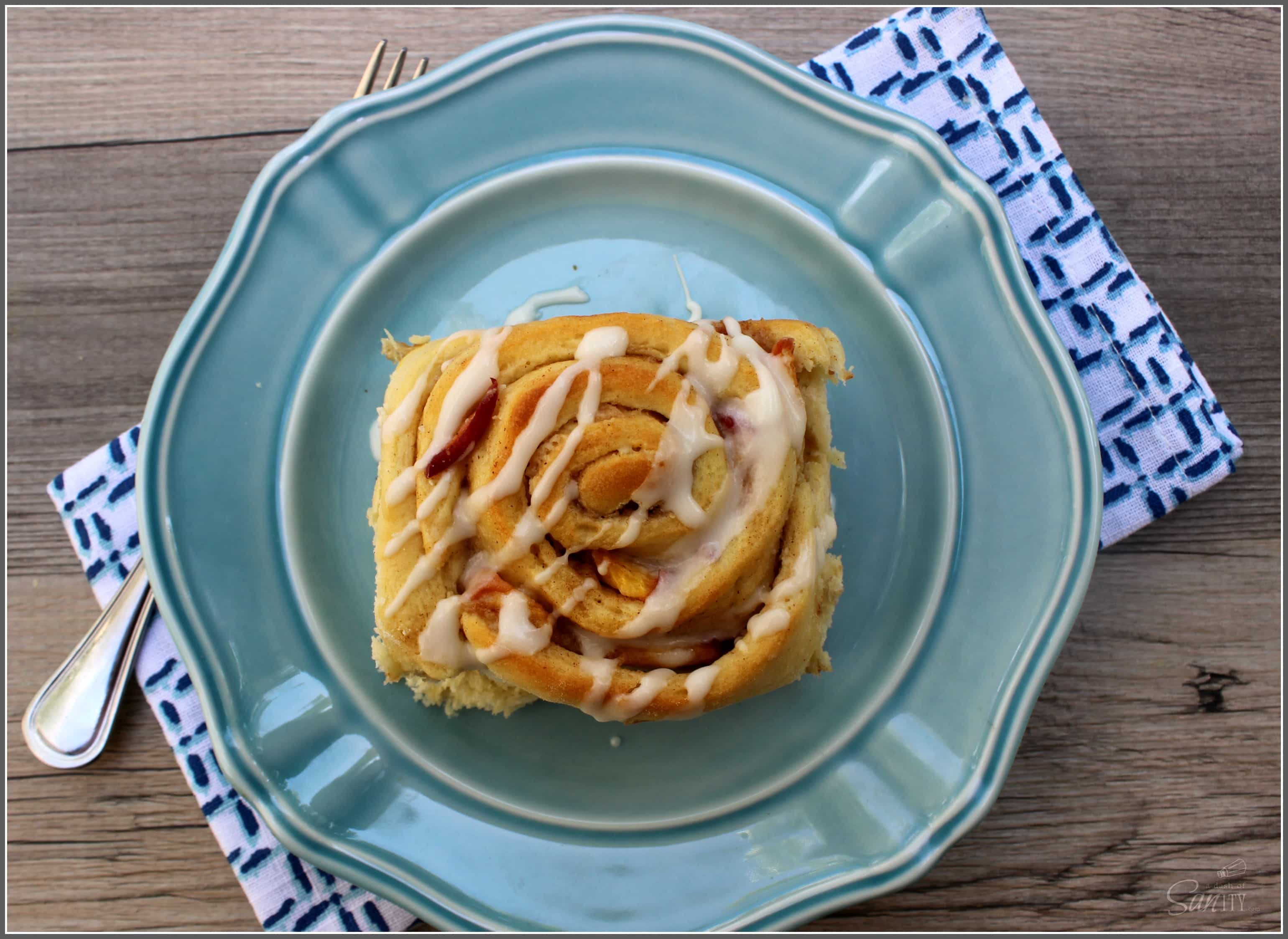 Fresh Peach & White Chocolate Sweet Rolls with white chocolate filling, fresh peaches, cinnamon, and sugar will please anyone with a sweet tooth or not. Fresh Peach & White Chocolate Sweet Rolls