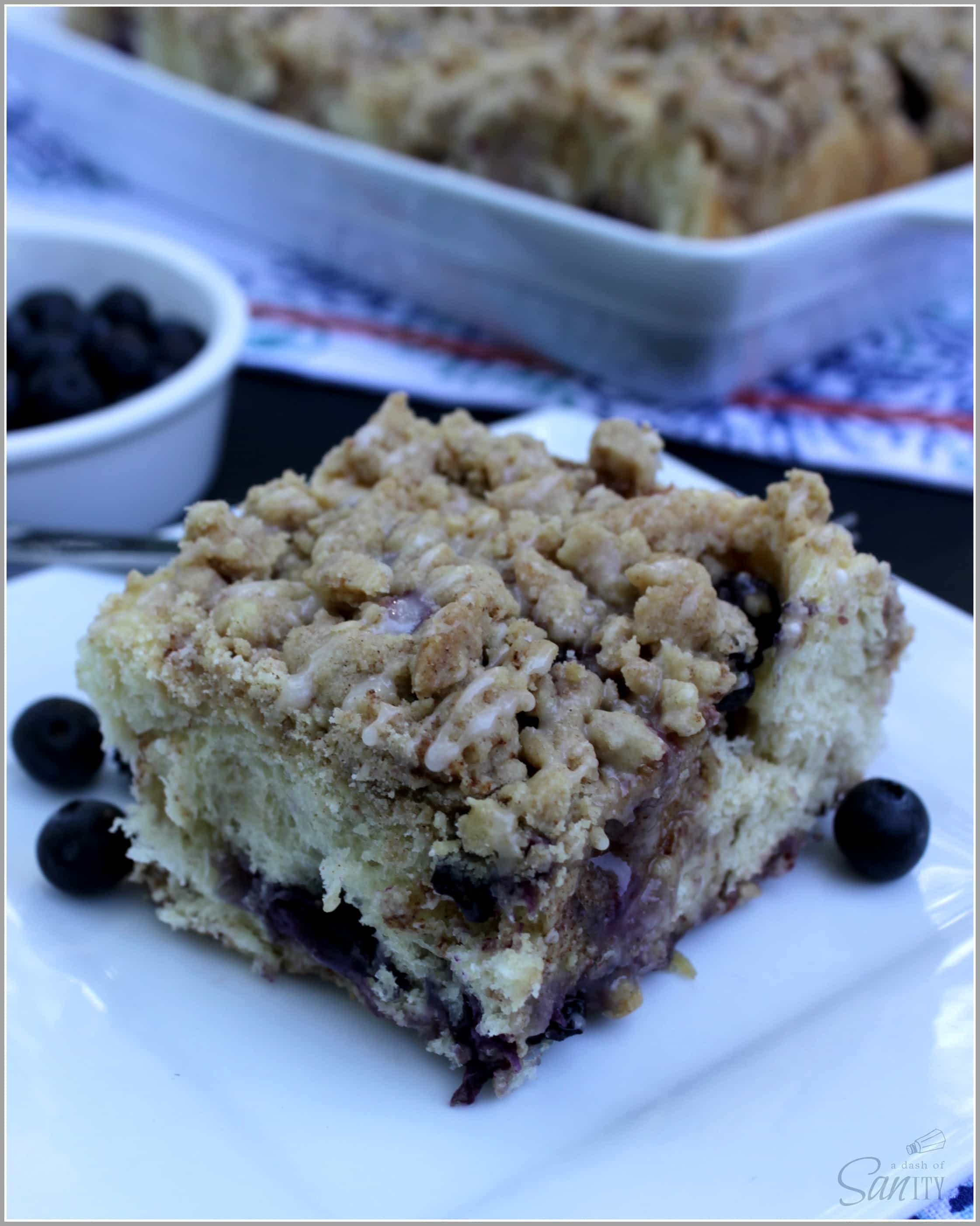 Blueberry Crumb Sweet Rolls with fresh blueberries & a creamy cinnamon center, then topped with a crumb topping, marrying two morning favorites.