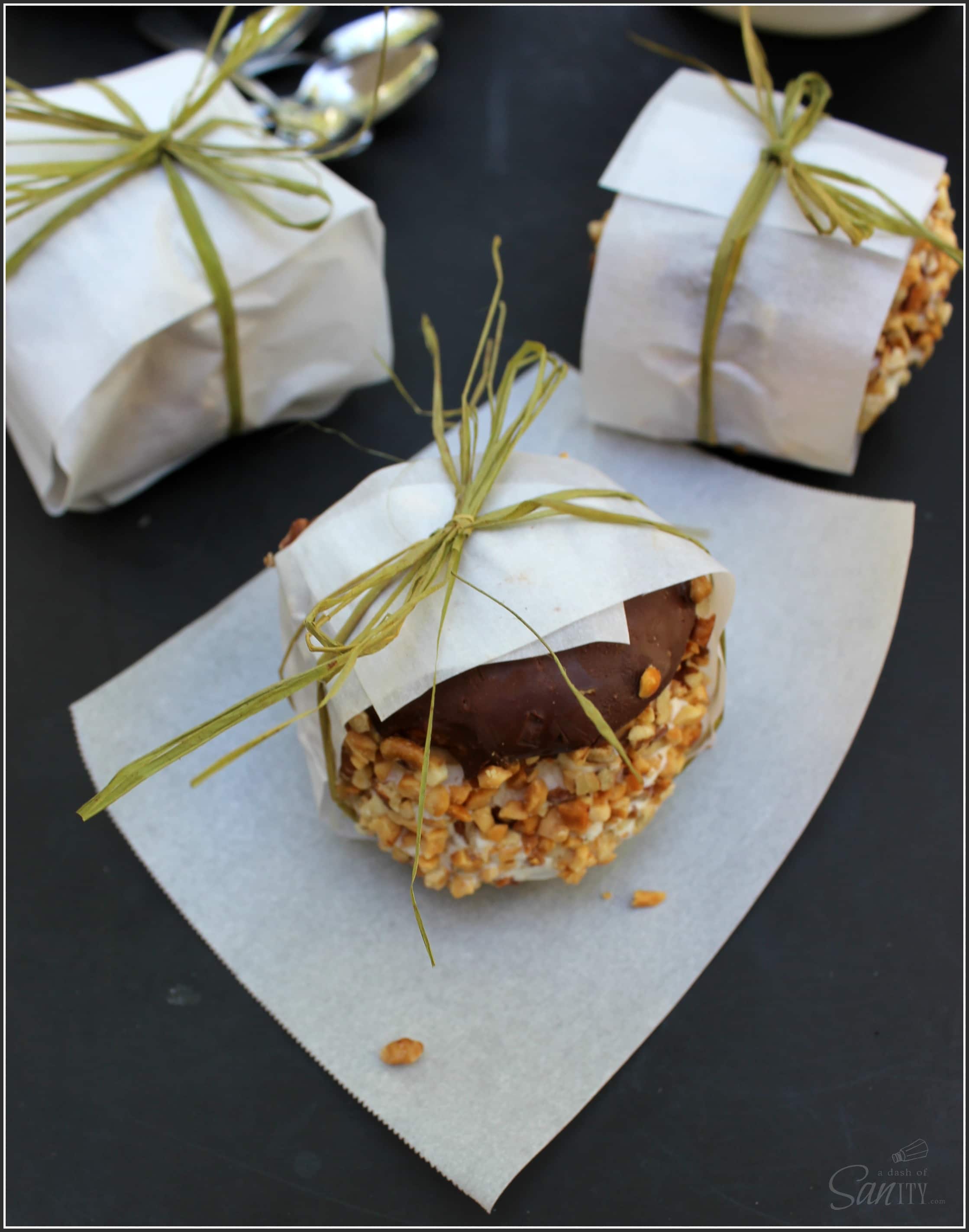 Homemade Tagalong Ice Cream Sliders- a vanilla wafer slider covered in chocolate ganache with layers of peanut butter and a vanilla ice cream center.