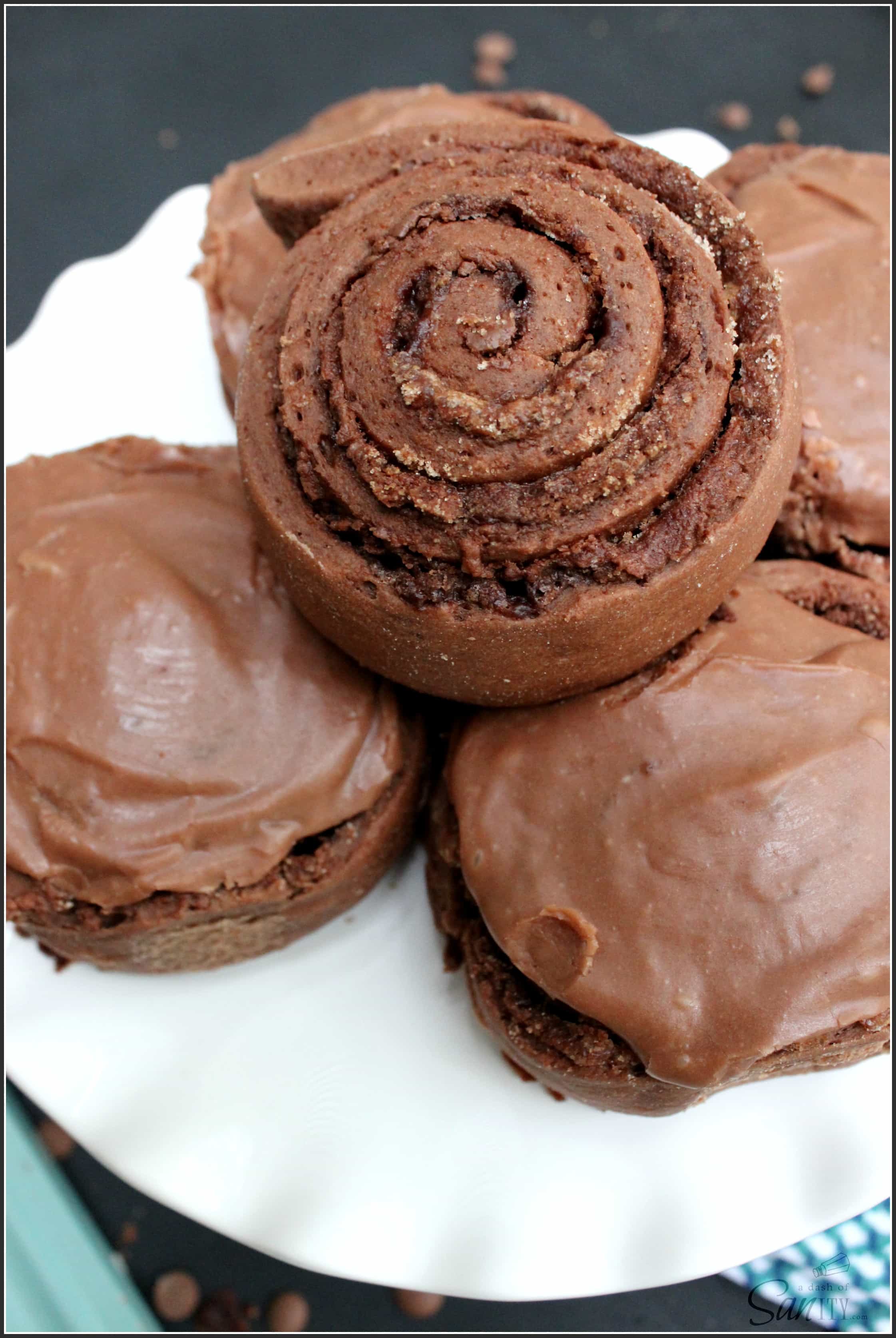 Double Chocolate Nutella Cinnamon Rolls are the best treat ever made. A chocolate sweet roll with a Nutella cinnamon center and fudgey chocolate frosting. Double Chocolate Nutella Cinnamon Rolls are the best treat ever made. A chocolate sweet roll with a Nutella cinnamon center and fudgey chocolate frosting.