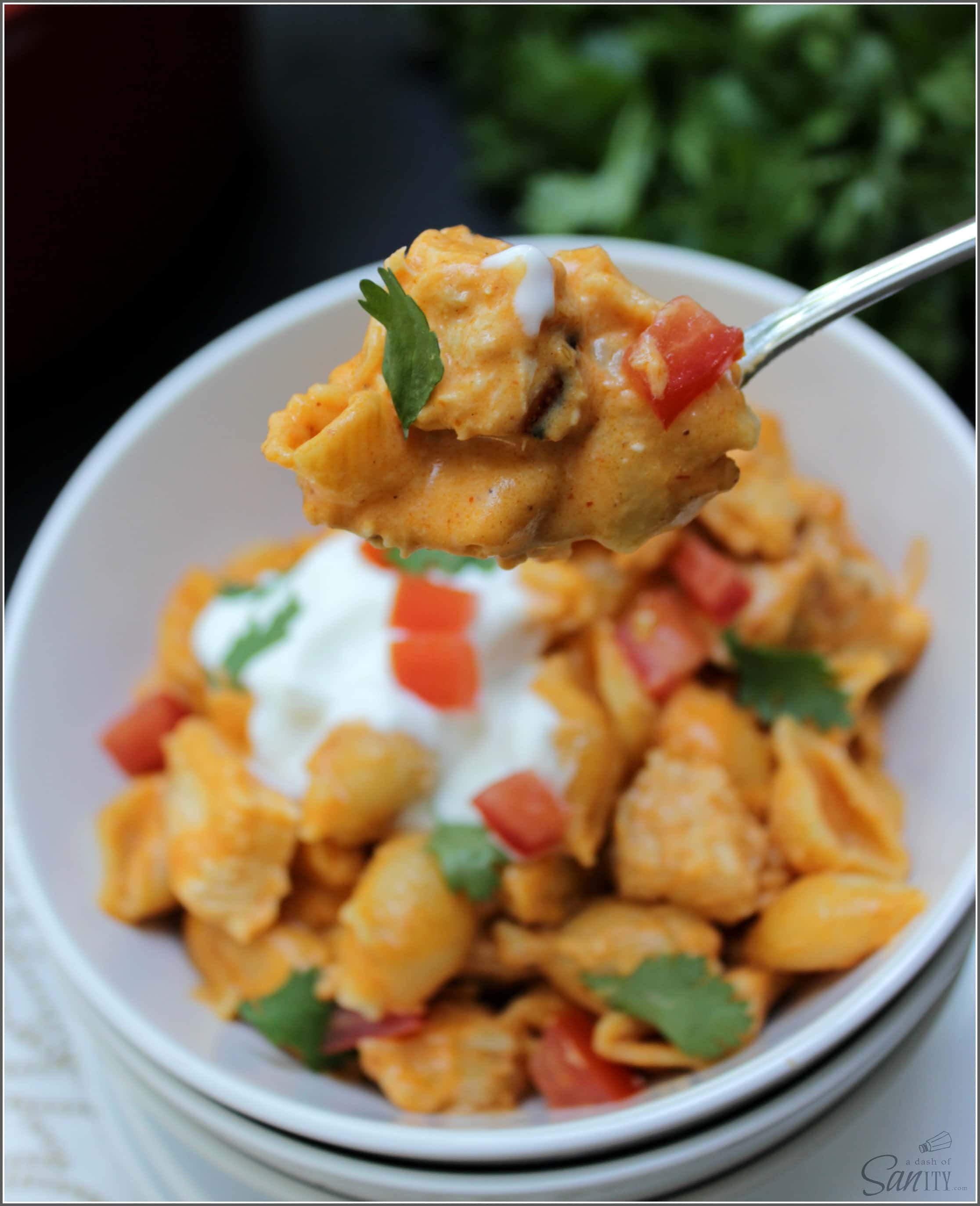 This Creamy Chicken Enchilada Mac & Cheese is a twist on two classics, made with a 3-cheese enchilada sauce and tossed with chicken and noodles.