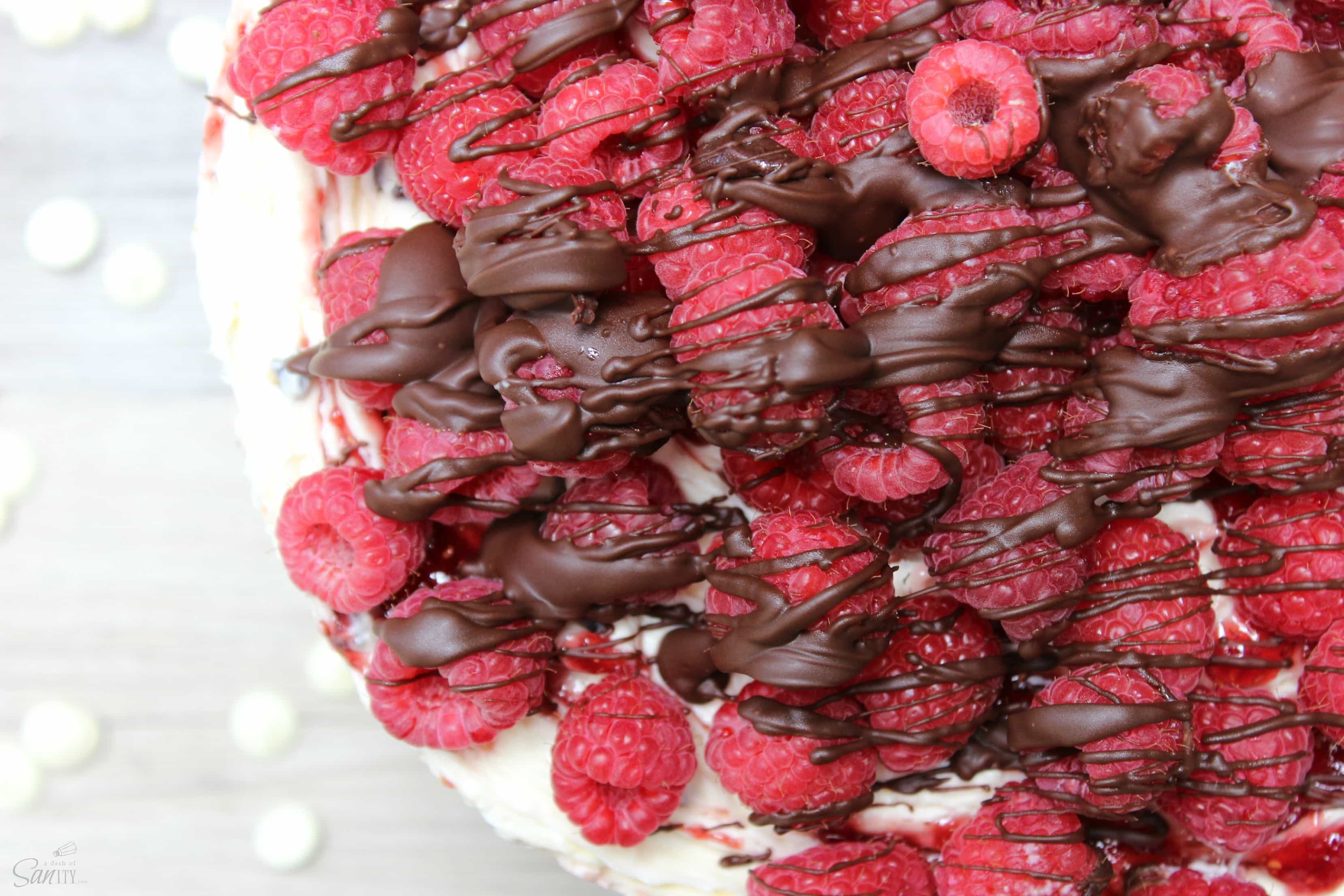 White Chocolate Raspberry Truffle No Bake Cheesecake laced with raspberry preserves & truffle chunks. Easy, delicious dessert you can prepare in 30 minutes. White Chocolate Raspberry Truffle No Bake Cheesecake laced with raspberry preserves & truffle chunks. Easy, delicious dessert you can prepare in 30 minutes.