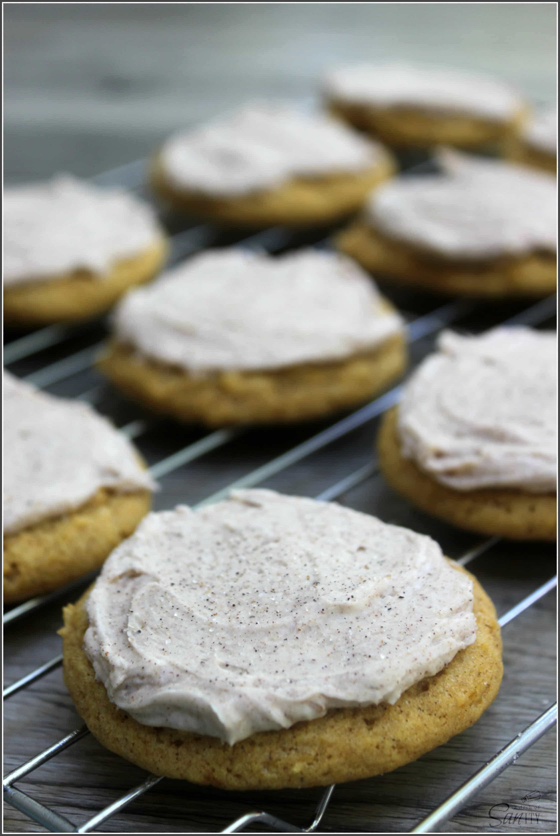 These chewy Frosted Soft Pumpkin Sugar Cookies are topped with a Pumpkin Spiced Buttercream. They are a perfect fall twist on classic sugar cookies.