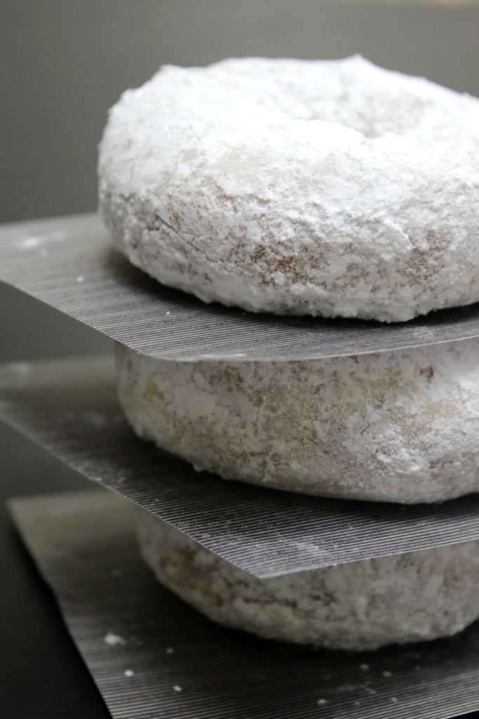 powdered sugar cake donuts stack