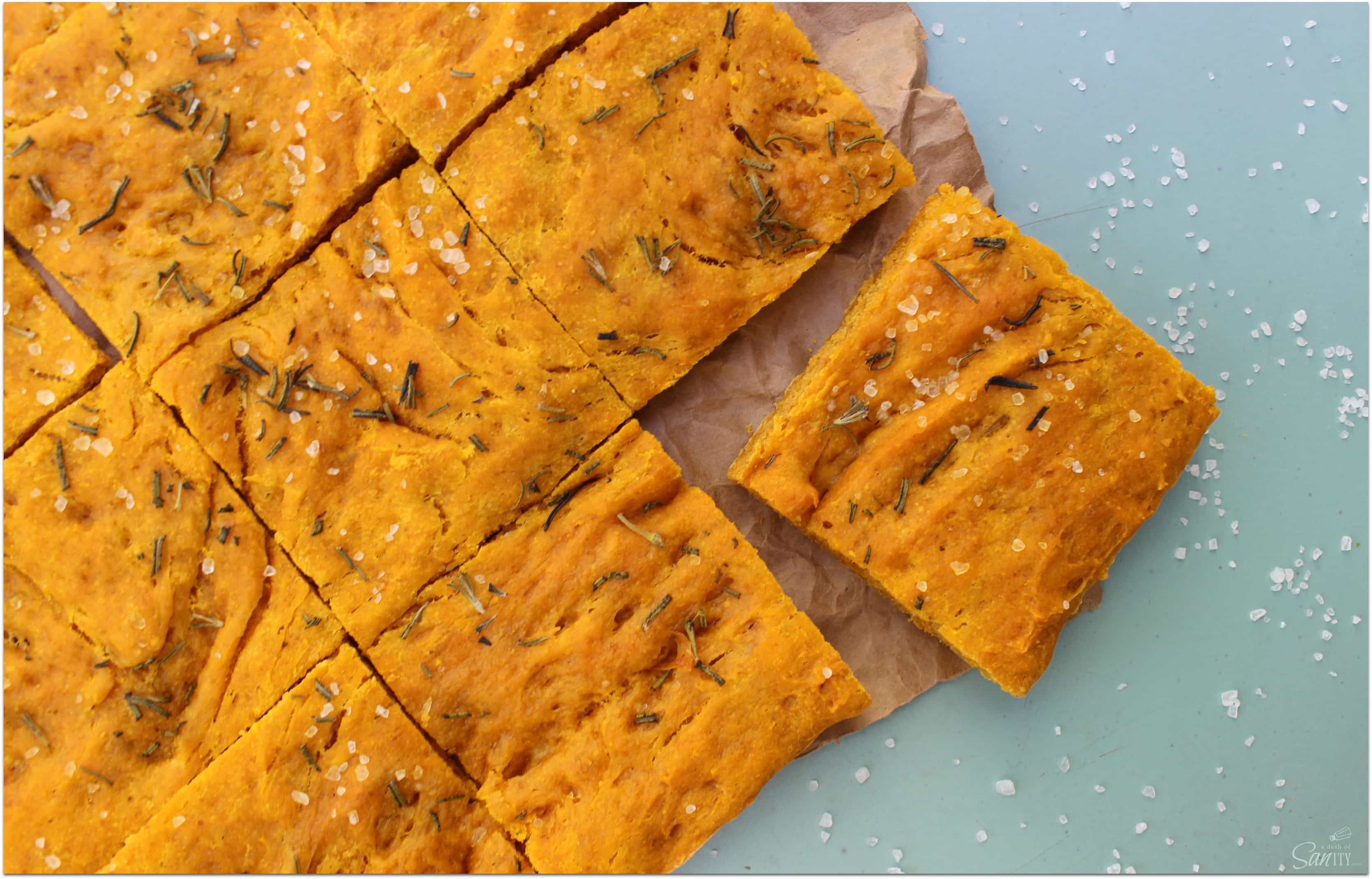 This Pumpkin Focaccia Bread is a savory fall inspired bread made with fresh pumpkin and rosemary. It is an easy to make addition to your holiday spread. This Pumpkin Focaccia Bread is a savory fall inspired bread made with fresh pumpkin and rosemary. It is an easy to make addition to your holiday spread.