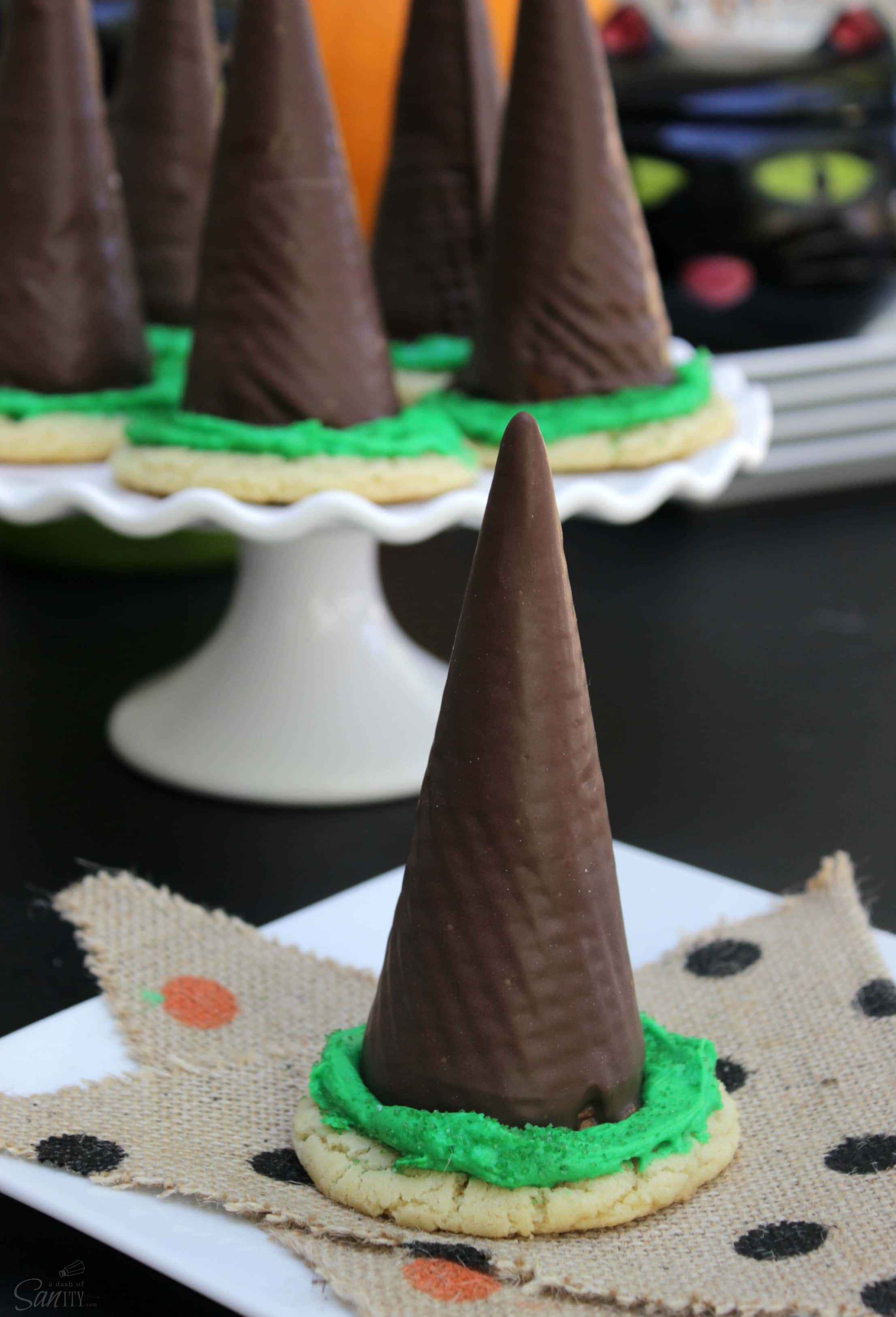 Transform your Halloween party into a "witchy" celebration with these delicious and cute Witch Hat Sugar Cookies. They are so easy and fun to make!
