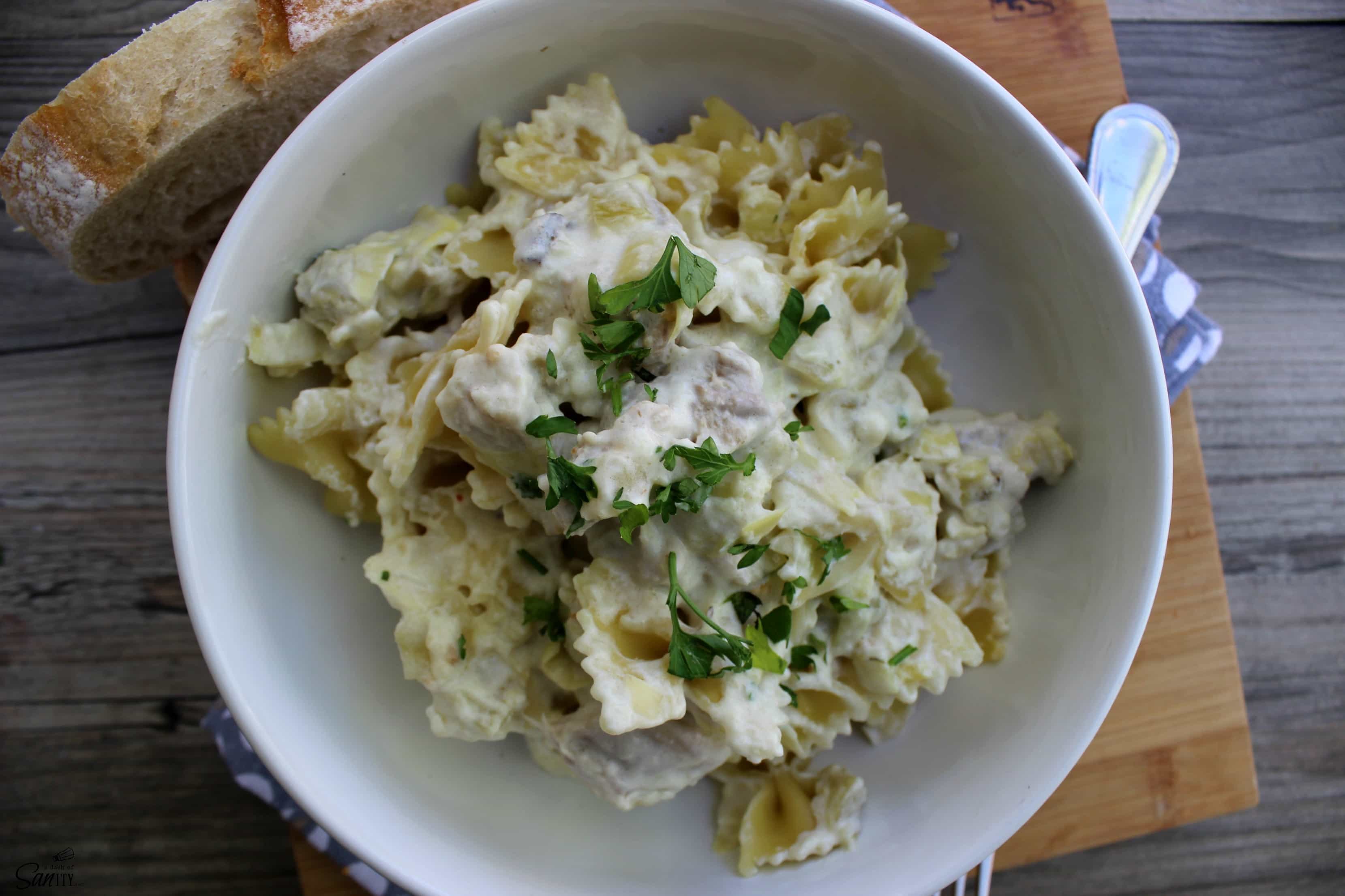 Creamy Chicken & Artichoke Pasta was inspired from one of our favorite appetizers. Made with chicken, artichokes, Parmesan, cream cheese, & green chiles.
