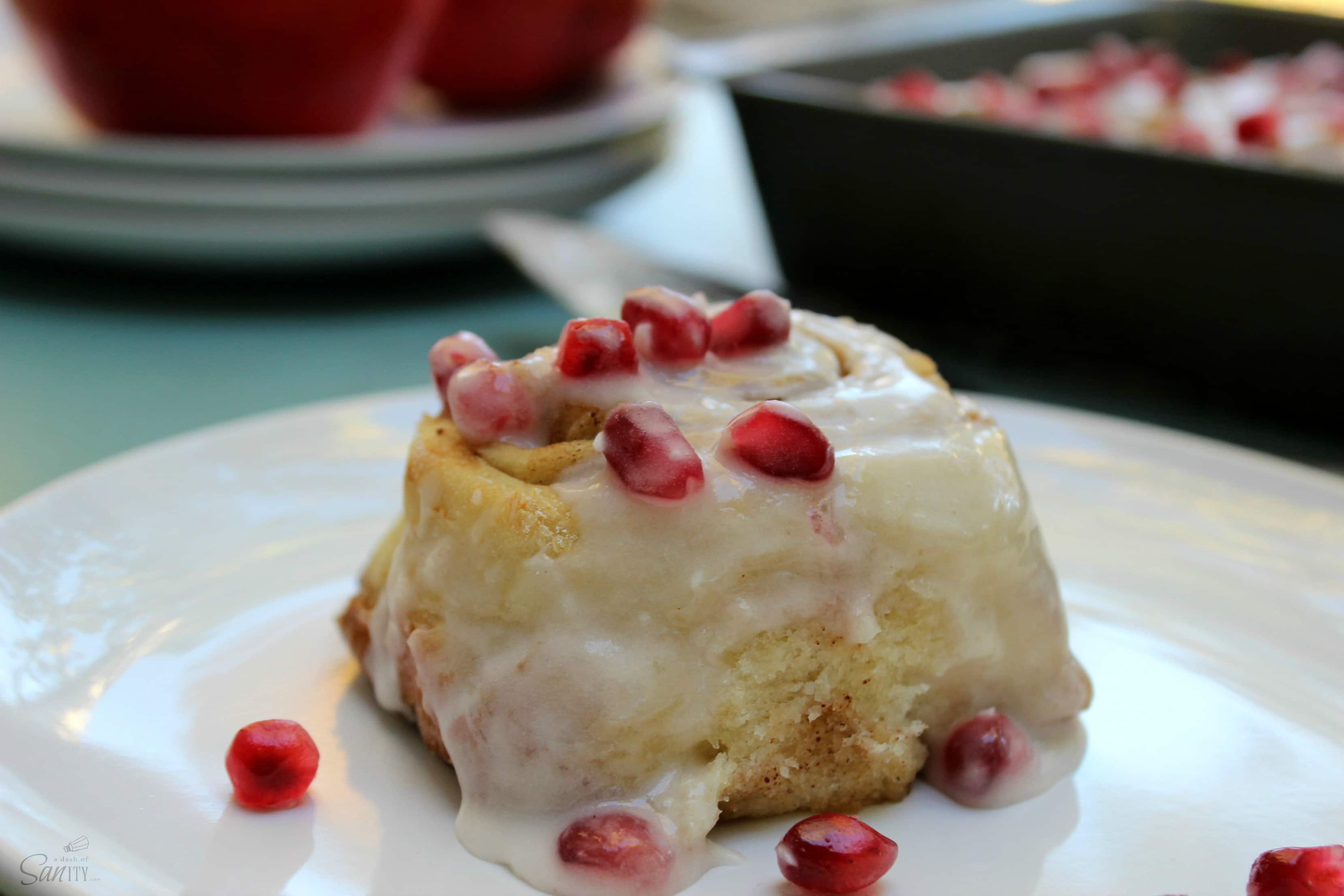 These Pomegranate Sweet Rolls are made with fresh pomegranate, brown sugar, cinnamon, nutmeg, & cloves. They add a touch of color to your holiday spread.