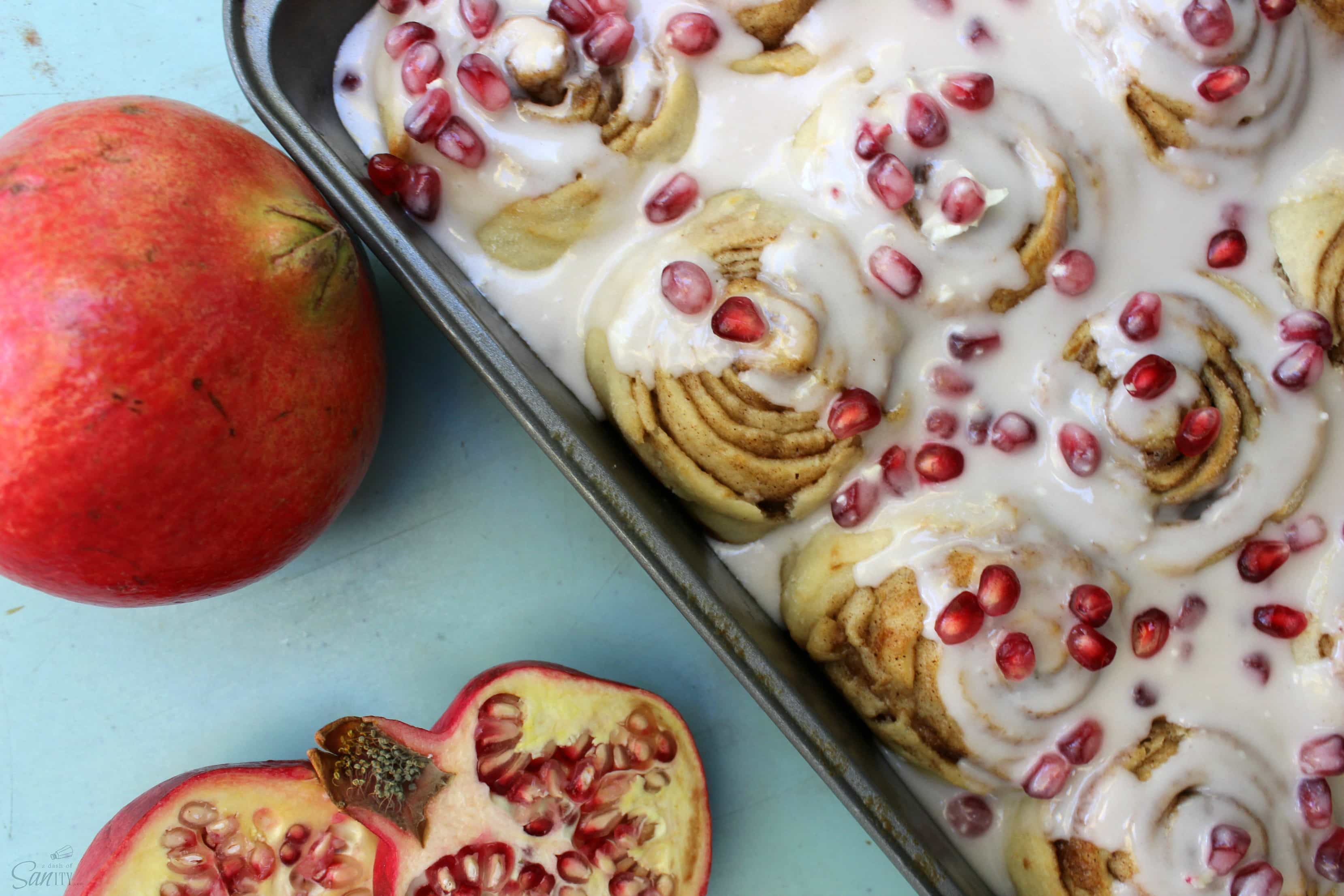 These Pomegranate Sweet Rolls are made with fresh pomegranate, brown sugar, cinnamon, nutmeg, & cloves. They add a touch of color to your holiday spread.