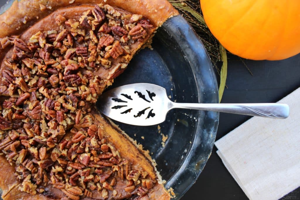 Chocolate Pecan Pumpkin Pie rich chocolate "brownie like" bottom, classic pumpkin pie and topped with pecans all baked into one delicious pie.