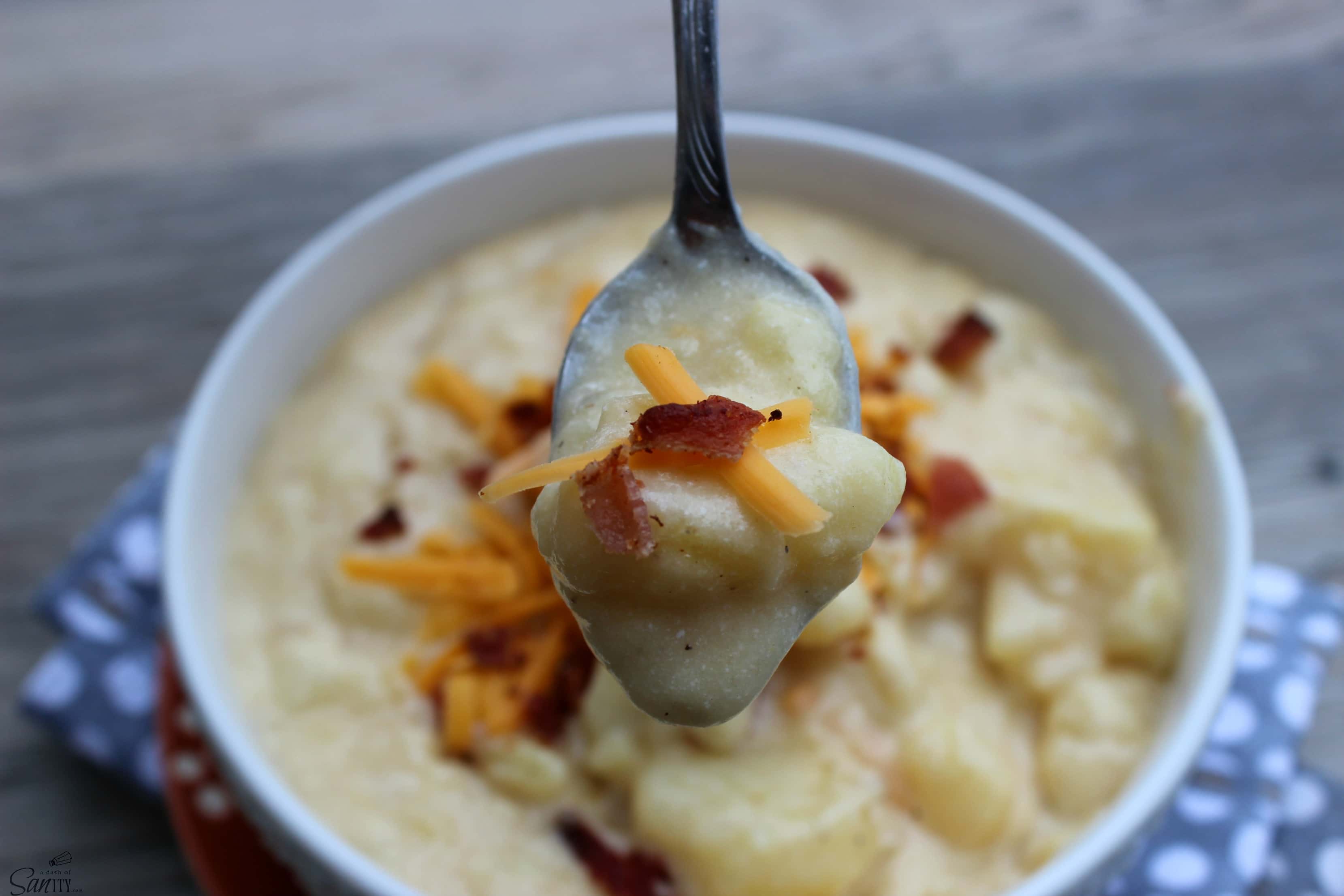 Baked Potato Soup has all the flavors of a “loaded” baked potato with sour cream, cheddar cheese, bacon crumbles, & onion, then seasoned with salt & pepper.