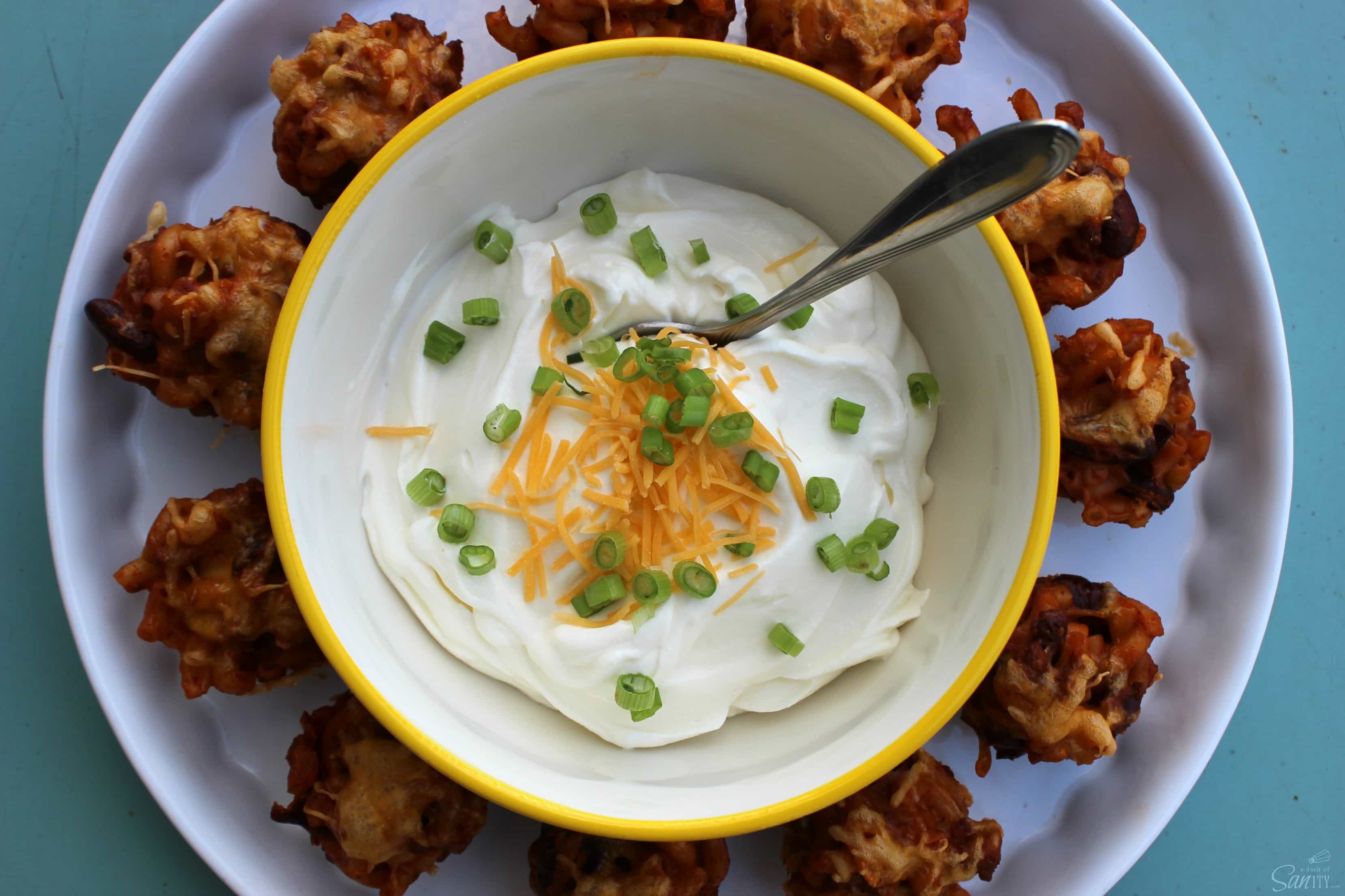 These Chili Cheese Mac Bites are perfect for a game day appetizer, a convenient bite for a party or a fun way to serve for dinner. An easy delicious recipe! These Chili Cheese Mac Bites are perfect for a game day appetizer, a convenient bite for a party or a fun way to serve for dinner. An easy delicious recipe!