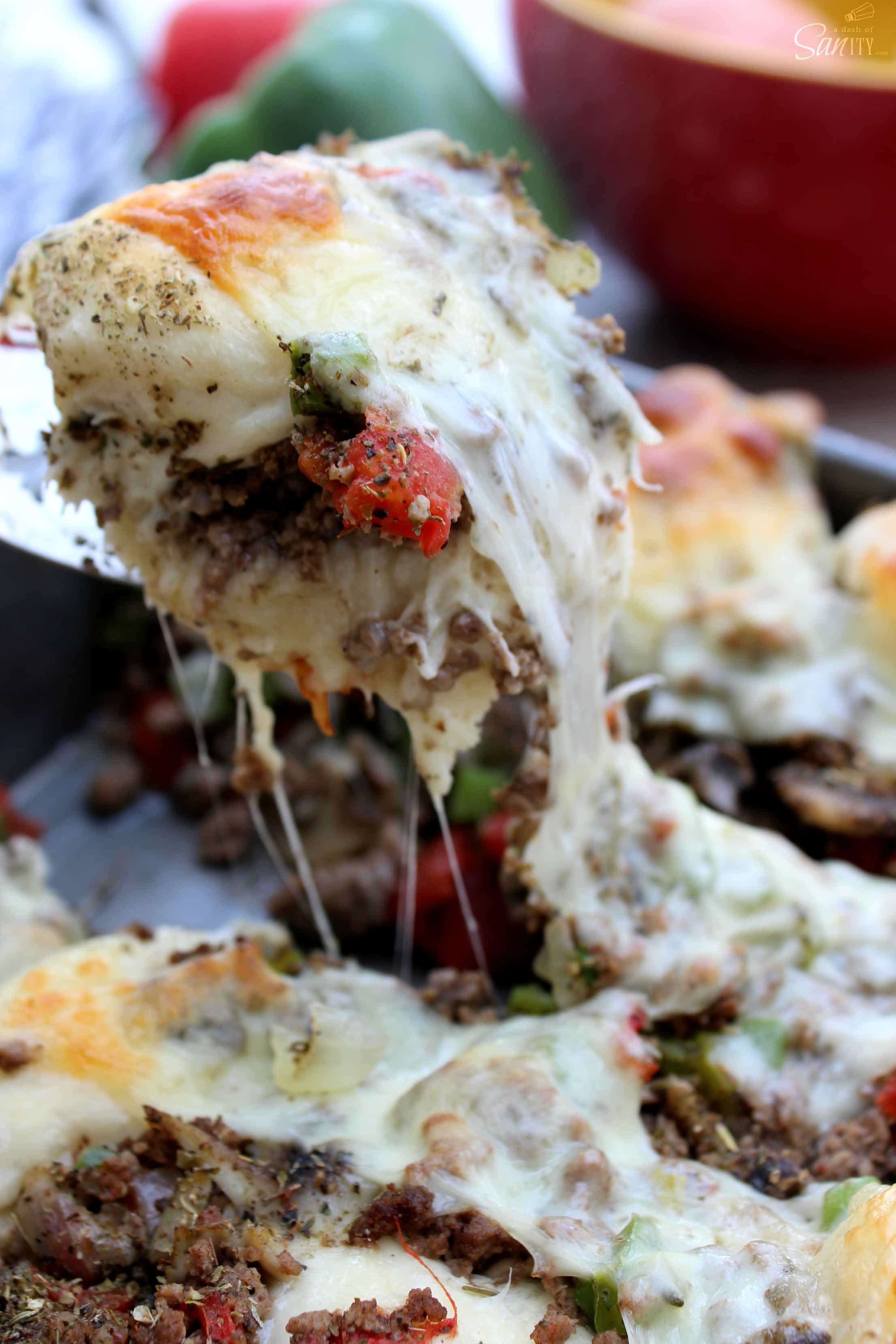 These Cheesy Pull Apart Italian Subs are so easy and delicious! Made with all the delicious toppings that are found in a traditional Italian Sub. 