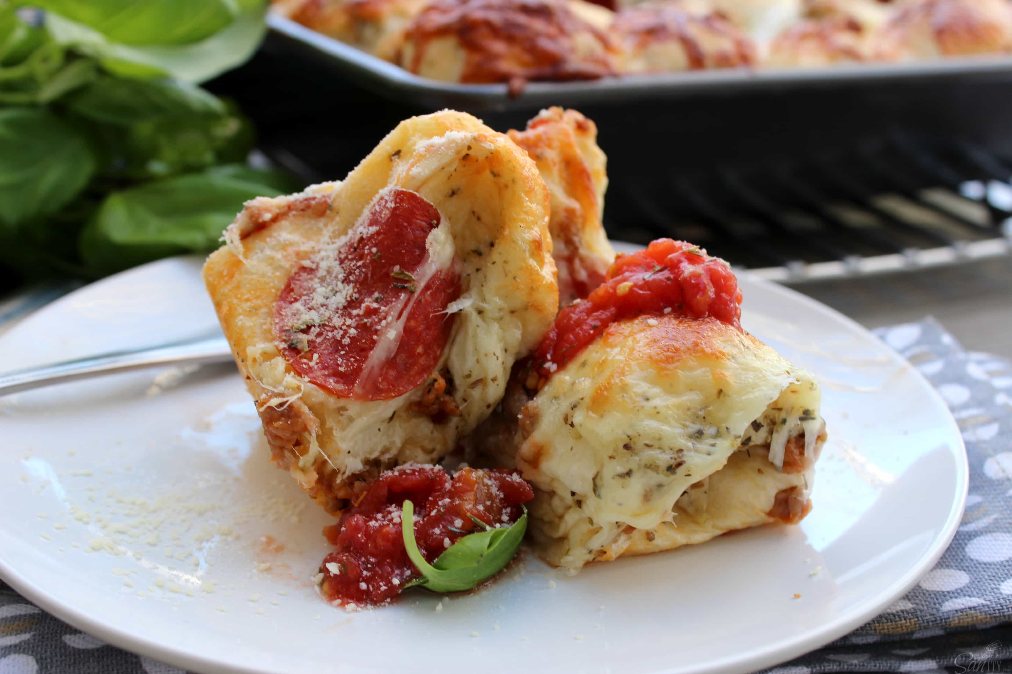 Pull Apart Pizza Bites are a quick, easy, and delicious meal to serve as a dinner or appetizer. Dress with the toppings you like from your favorite pizza.