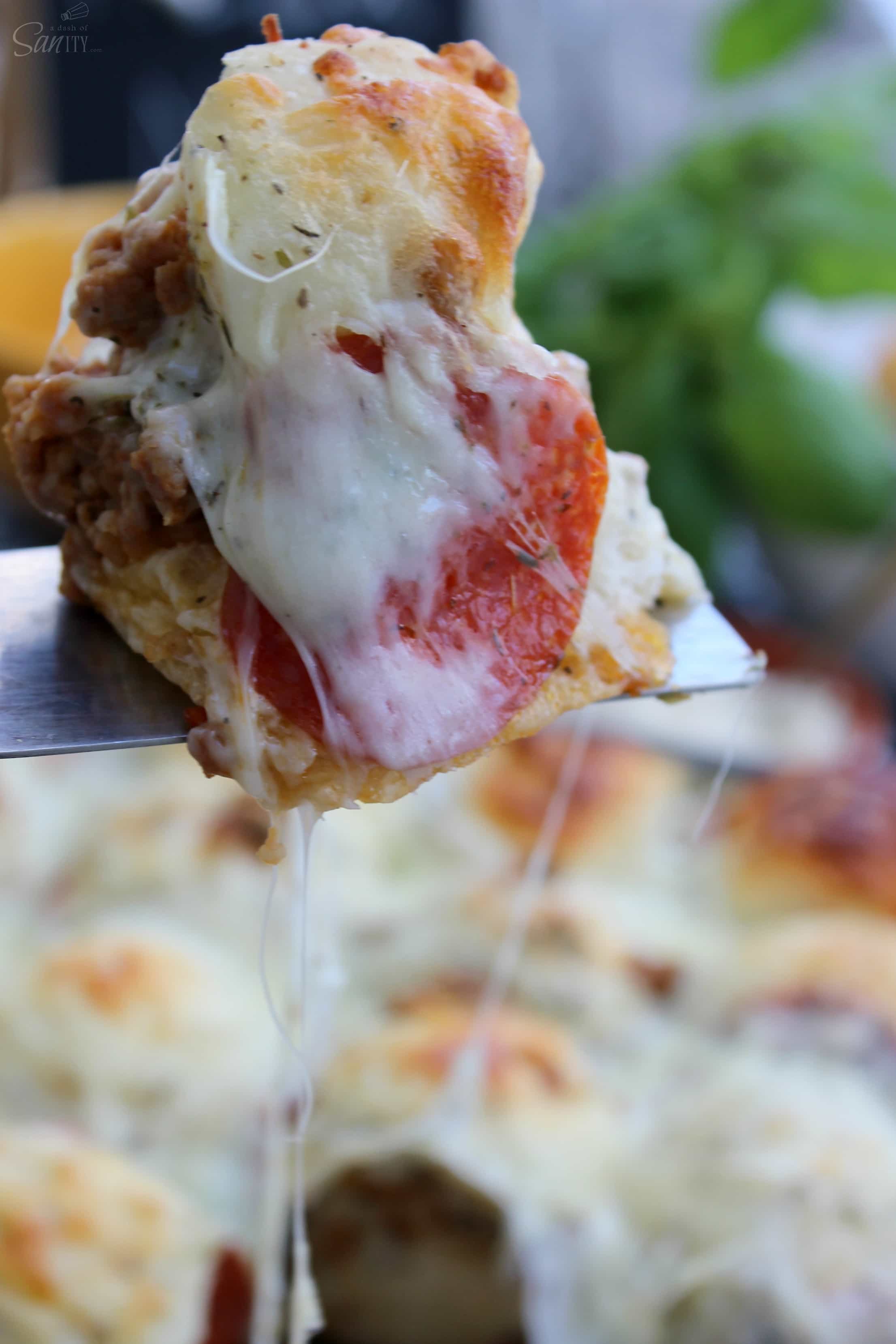 Pull Apart Pizza Bites are a quick, easy, and delicious meal to serve as a dinner or appetizer. Dress with the toppings you like from your favorite pizza.