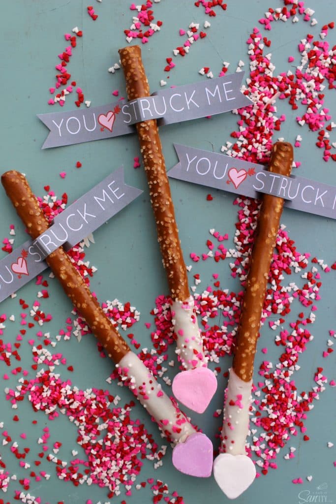 Cupid’s Arrow Pretzel Rods are a fun and festive Valentine’s Day treat. Using Vanilla CandiQuik and conversation candy hearts, these are easy to prepare. You Struck Me Cupid's Arrow Pretzel Rods view
