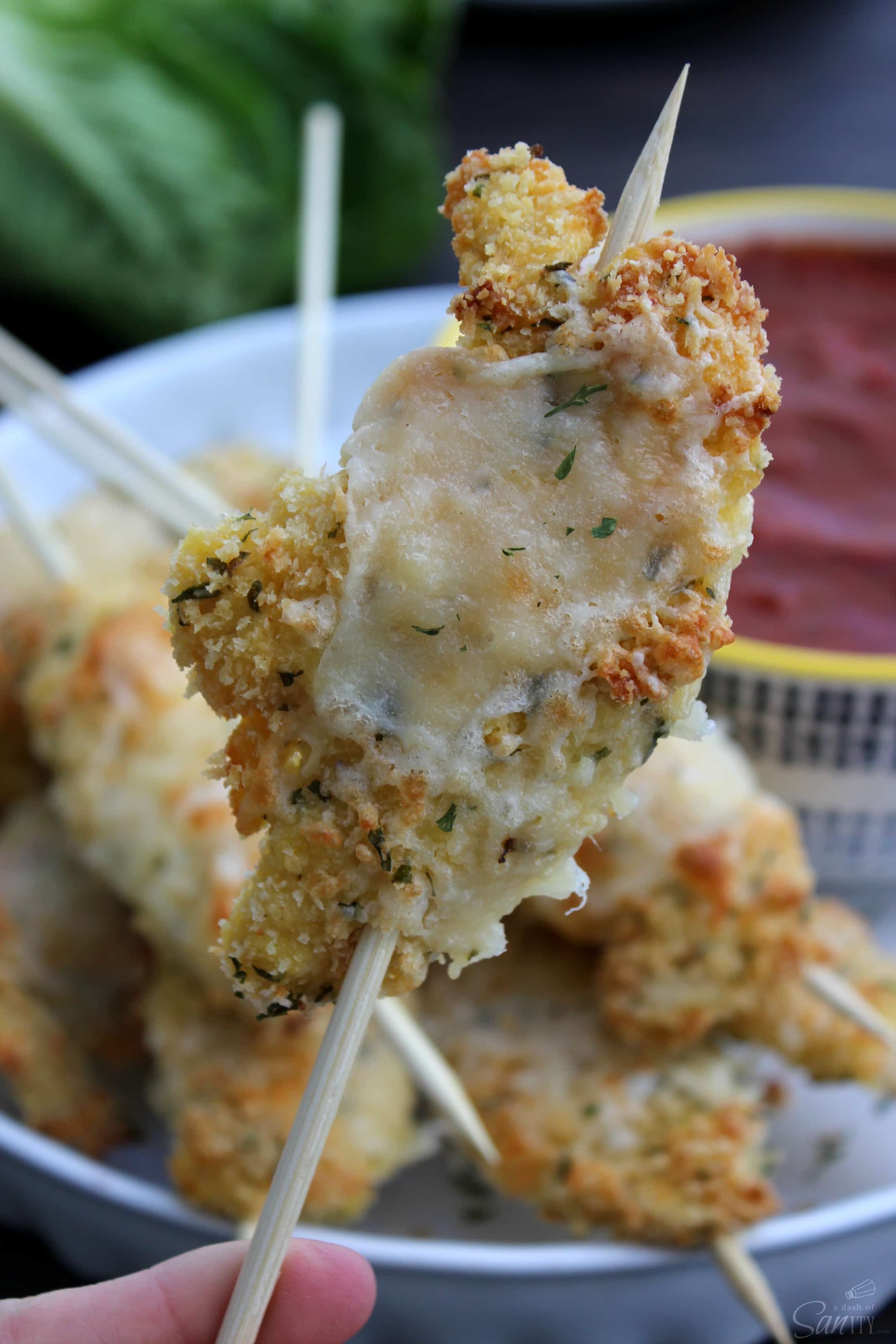 These Baked Chicken Parmesan Sticks are simple, easy, and best of all, baked! Coated in crisp panko crumbs & parmesan cheese, these make a delicious meal.