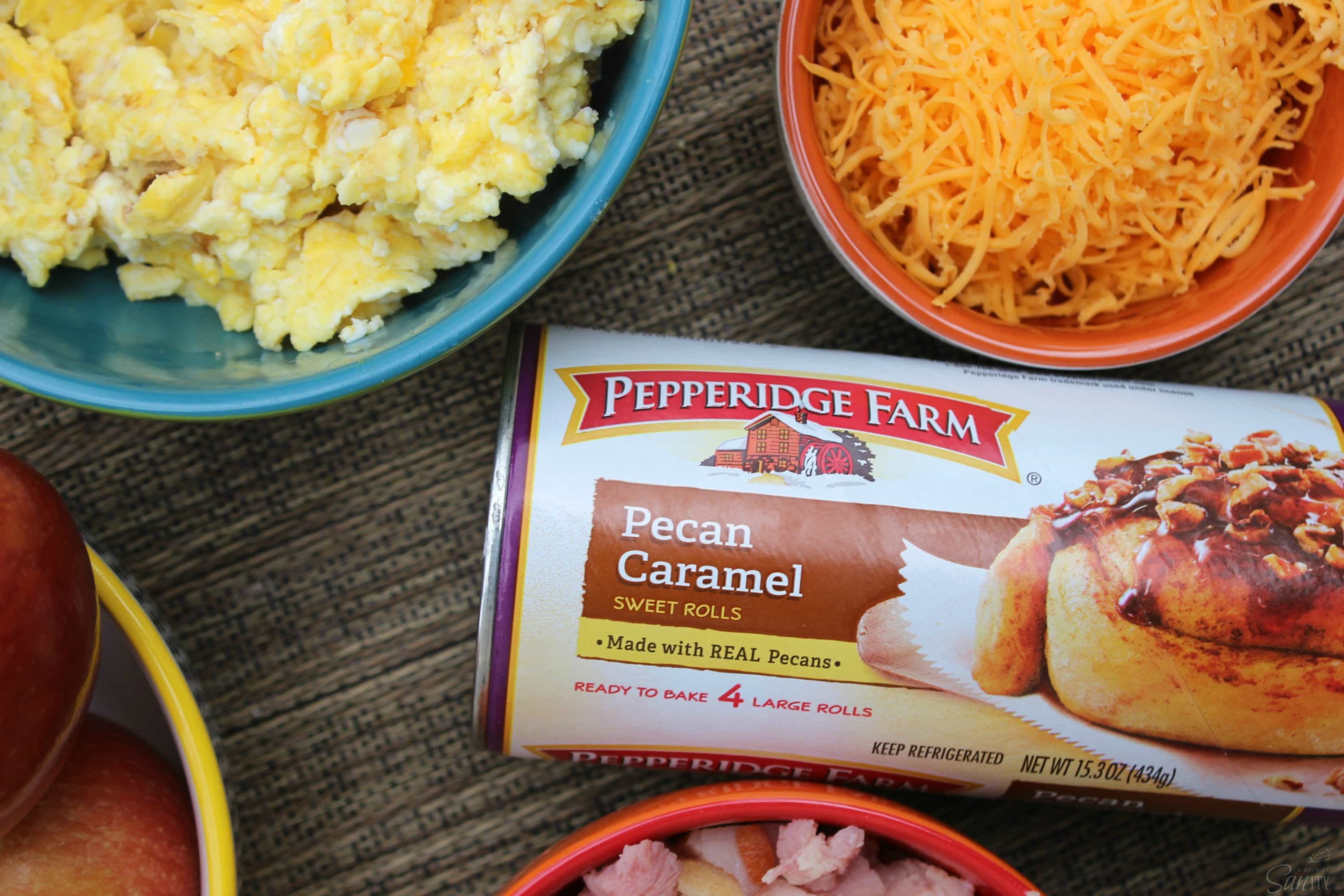 These Egg, Ham & Cheese Sweet & Savory Breakfast Roll Ups are a perfectly easy & delicious meal that will get your family going for the day. These Egg, Ham & Cheese Sweet & Savory Breakfast Roll Ups are a perfectly easy & delicious meal that will get your family going for the day.
