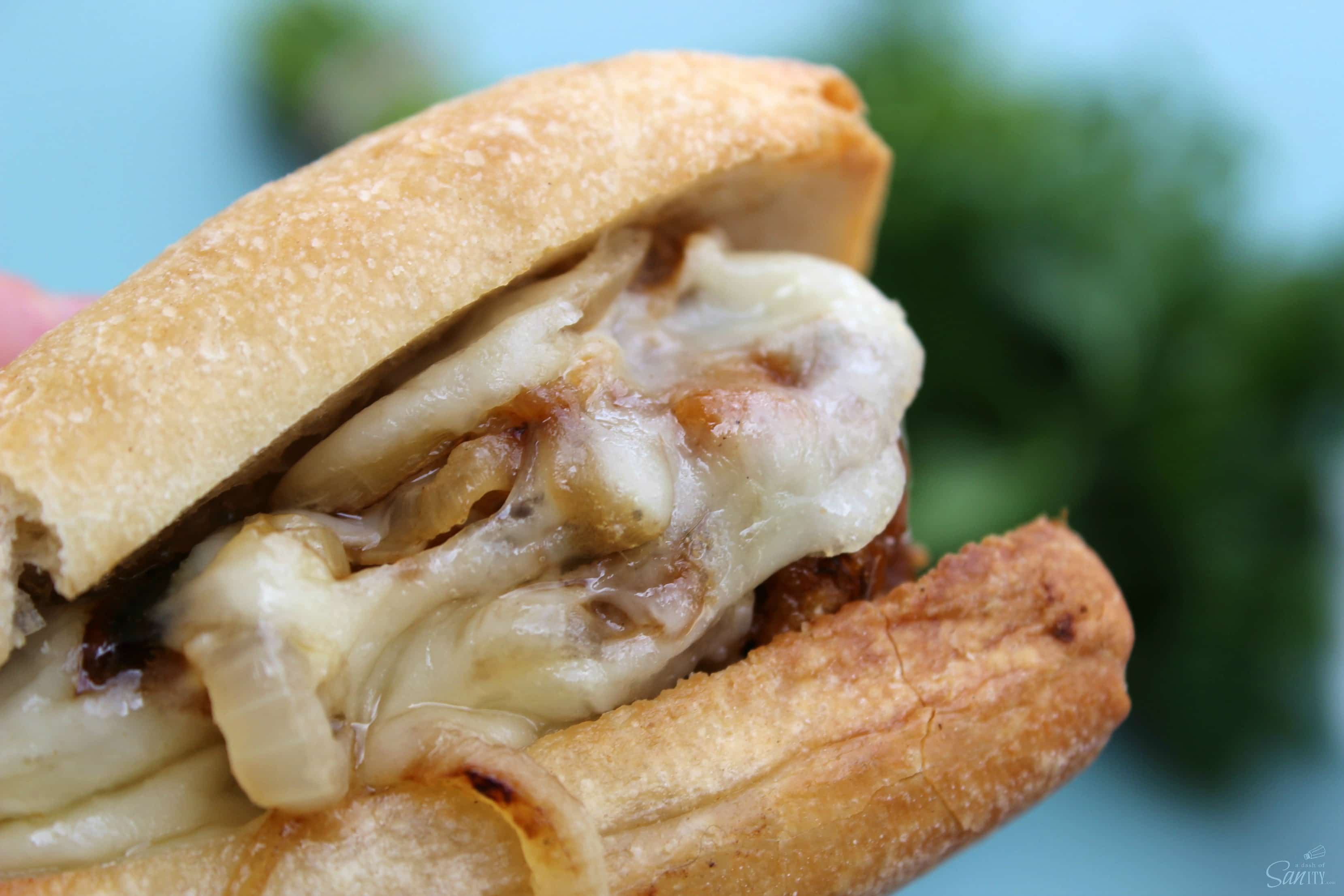 These French Onion Meatball Sandwiches are a cheesy onion-filled sandwich with meatballs. A delicious twist on French Onion Soup, a favorite classic.