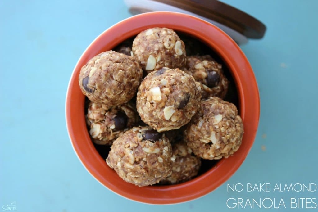 These No Bake Almond Granola Bites are made with almond butter, flaxseed, chocolate covered berries, and honey. They are a perfect snack sized bite. No Bake Almond Granola Bites overhead shot