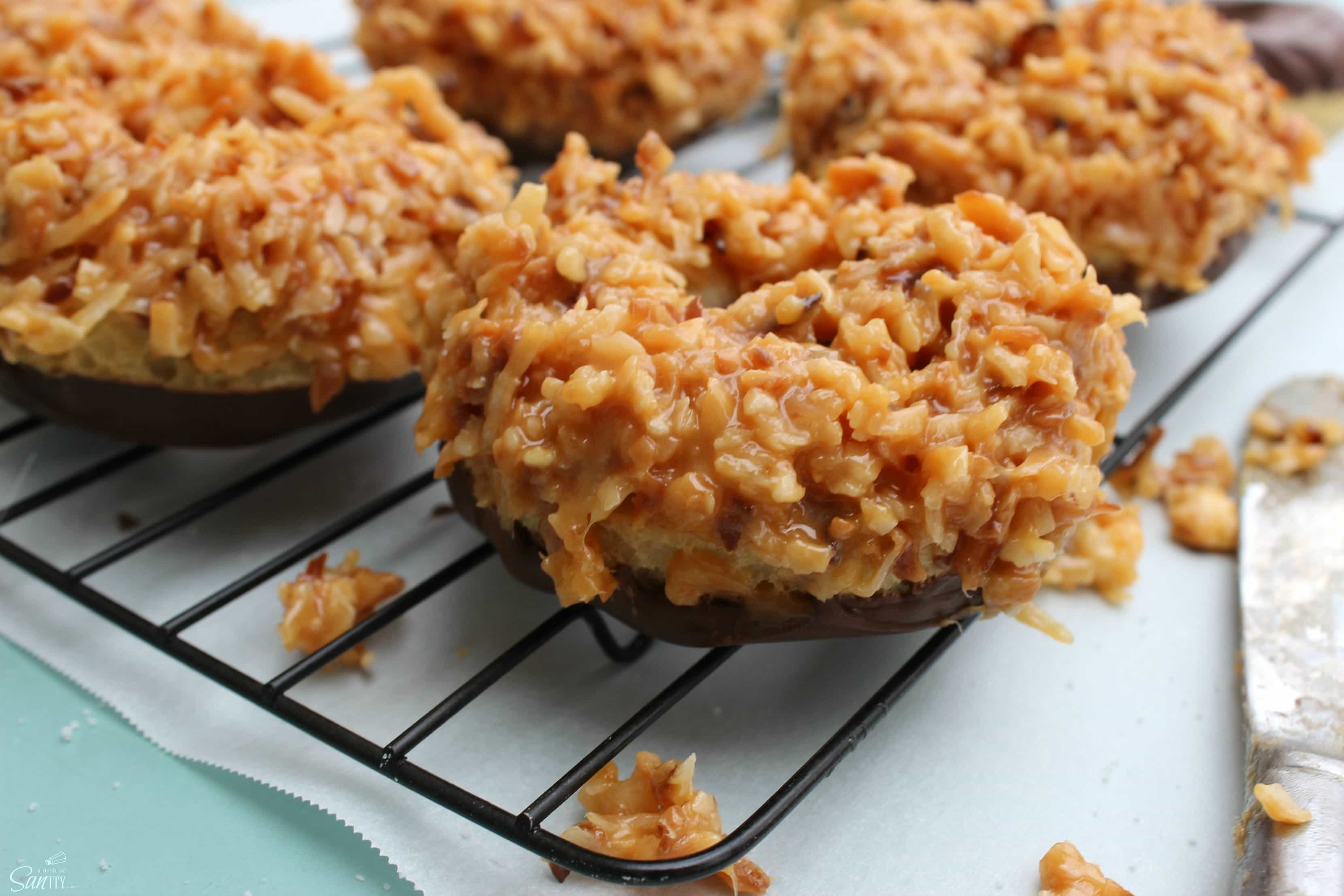 Samoa Donuts are like the real deal Girl Scout cookie but made with a soft, buttery, baked donut. Oh yeah, wipe the drool off the screen & make these ASAP.