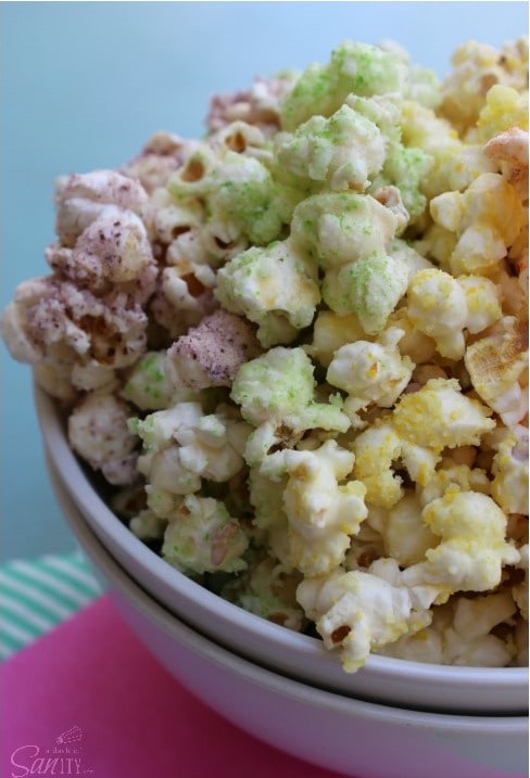Skittles Popcorn is so easy to make & fun to eat. This enjoyable fruit flavored popcorn will be a fan favorite. Dunk the rainbow, Taste the rainbow. Skittles Popcorn