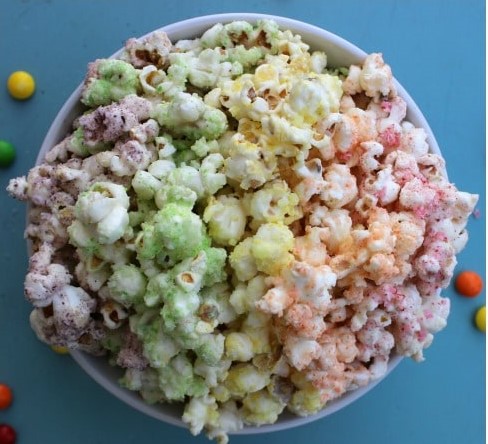 Skittles Popcorn is so easy to make & fun to eat. This enjoyable fruit flavored popcorn will be a fan favorite. Dunk the rainbow, Taste the rainbow. Skittles Popcorn is so easy to make & fun to eat. This enjoyable fruit flavored popcorn will be a fan favorite. Dunk the rainbow, Taste the rainbow.