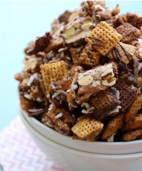 This Sweet & Salty Caramel Snack Mix is made with caramel, SNICKERS®, toasted coconut, chocolate & more caramel. This snack is seriously addicting. This Sweet & Salty Caramel Snack Mix is made with caramel, SNICKERS®, toasted coconut, chocolate & more caramel. This snack is seriously addicting.