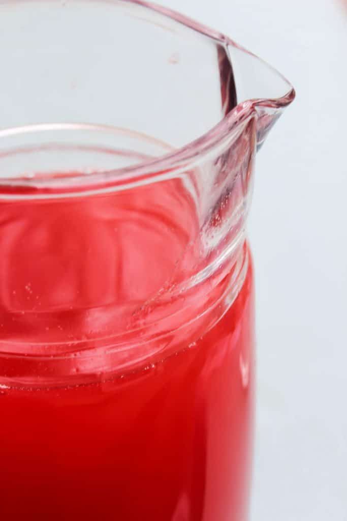 Copycat Hawaiian Punch in a glass pitcher up close
