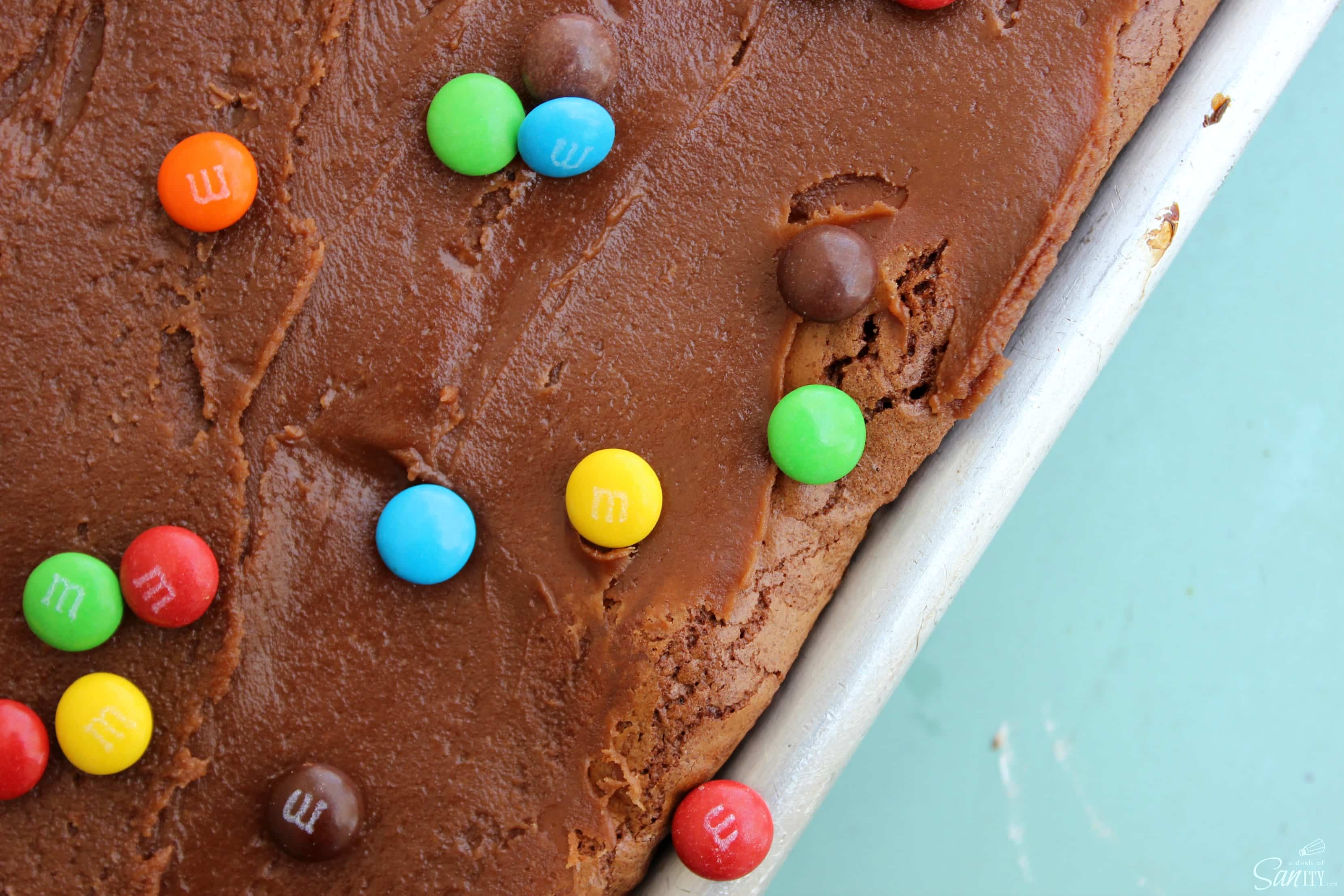 Millionaire Brownies are a double-chocolate brownie loaded with creamy peanut butter and pretzel M&M's®. You get all of your favorite snack treats in one.