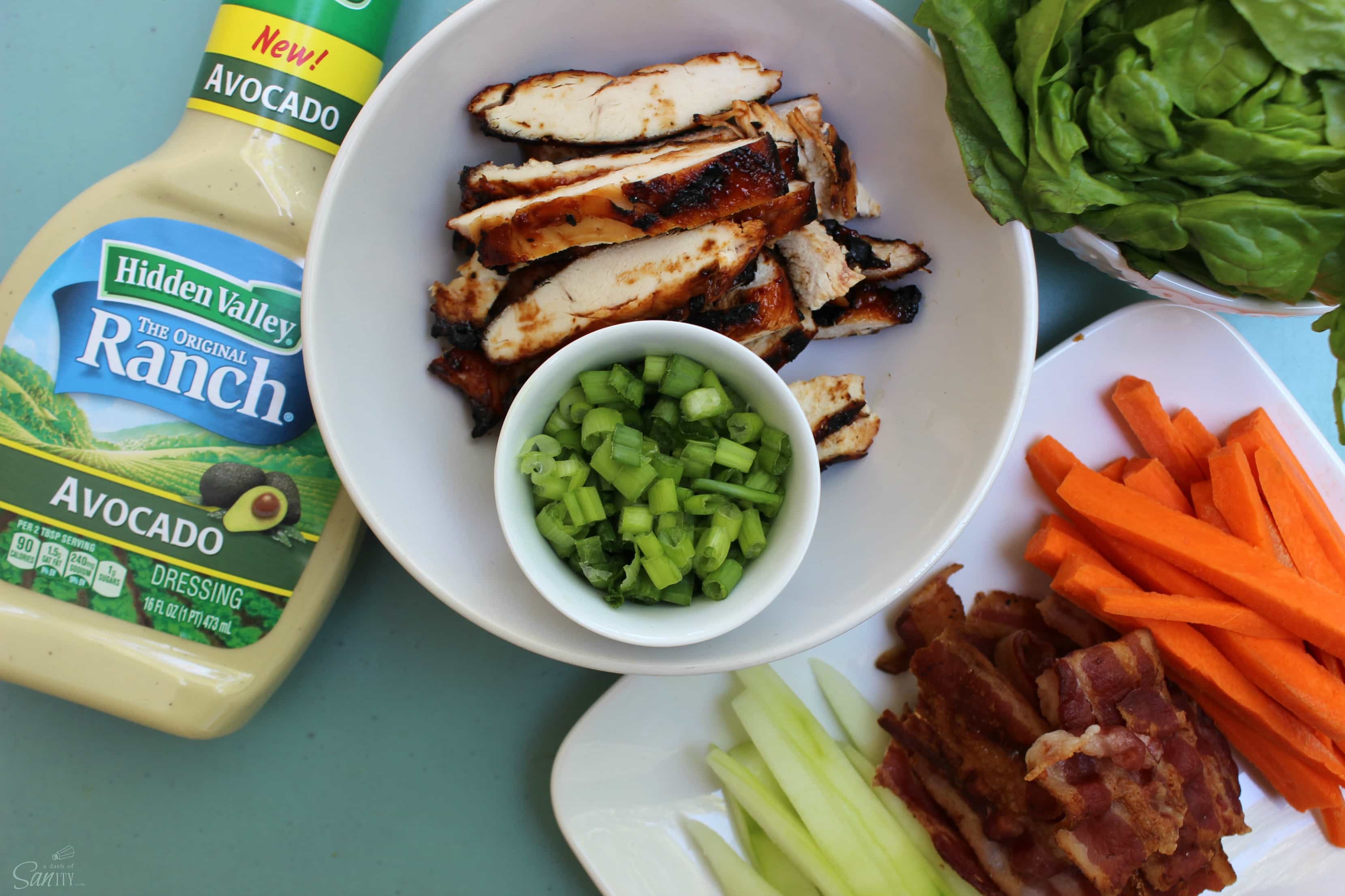 Barbecue Chicken Spring Rolls are full of flavor with fresh vegetables, barbecue chicken, bacon, Avocado Ranch dressing, and a drizzle of barbecue sauce.