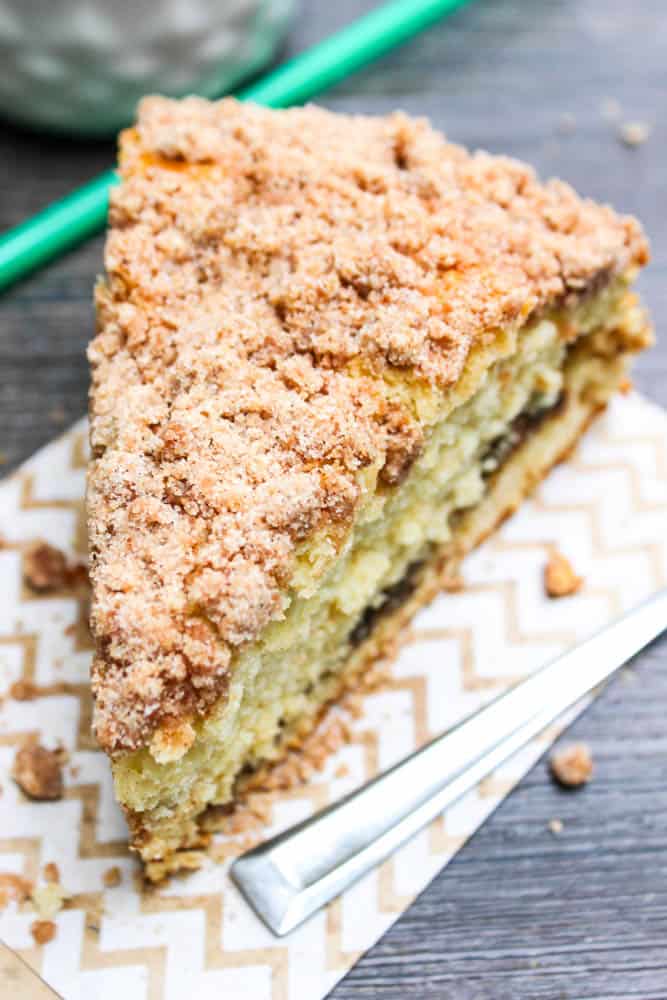 Cinnamon Swirl Coffee Cake slice on a napkin with a fork