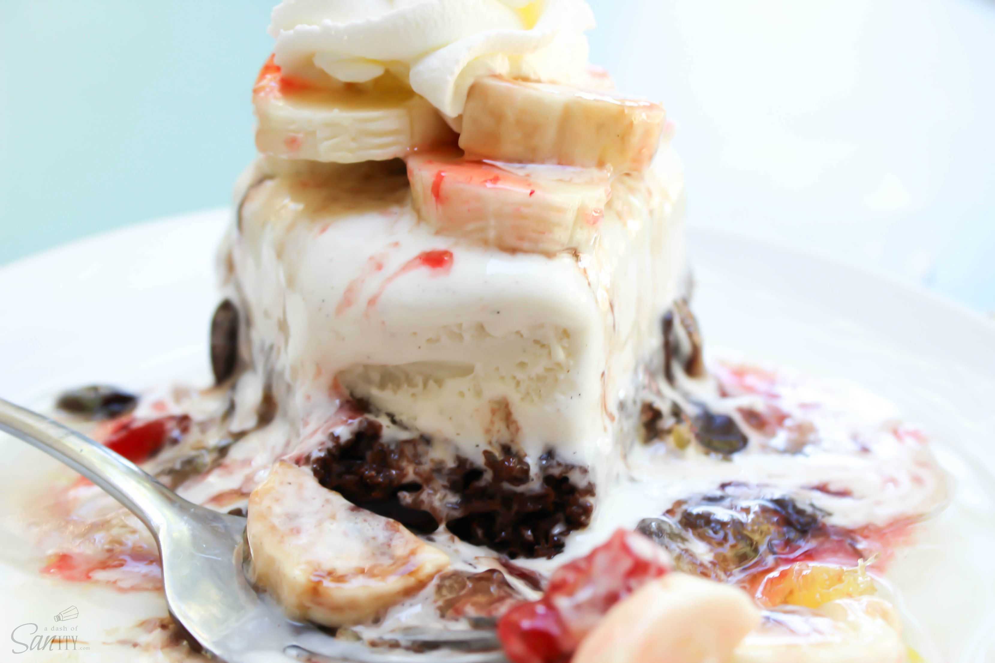 Banana Split Ice Cream Cake is a fun twist on a summer favorite. With a brownie crust, vanilla ice cream center, bananas, and your favorite sundae toppings.