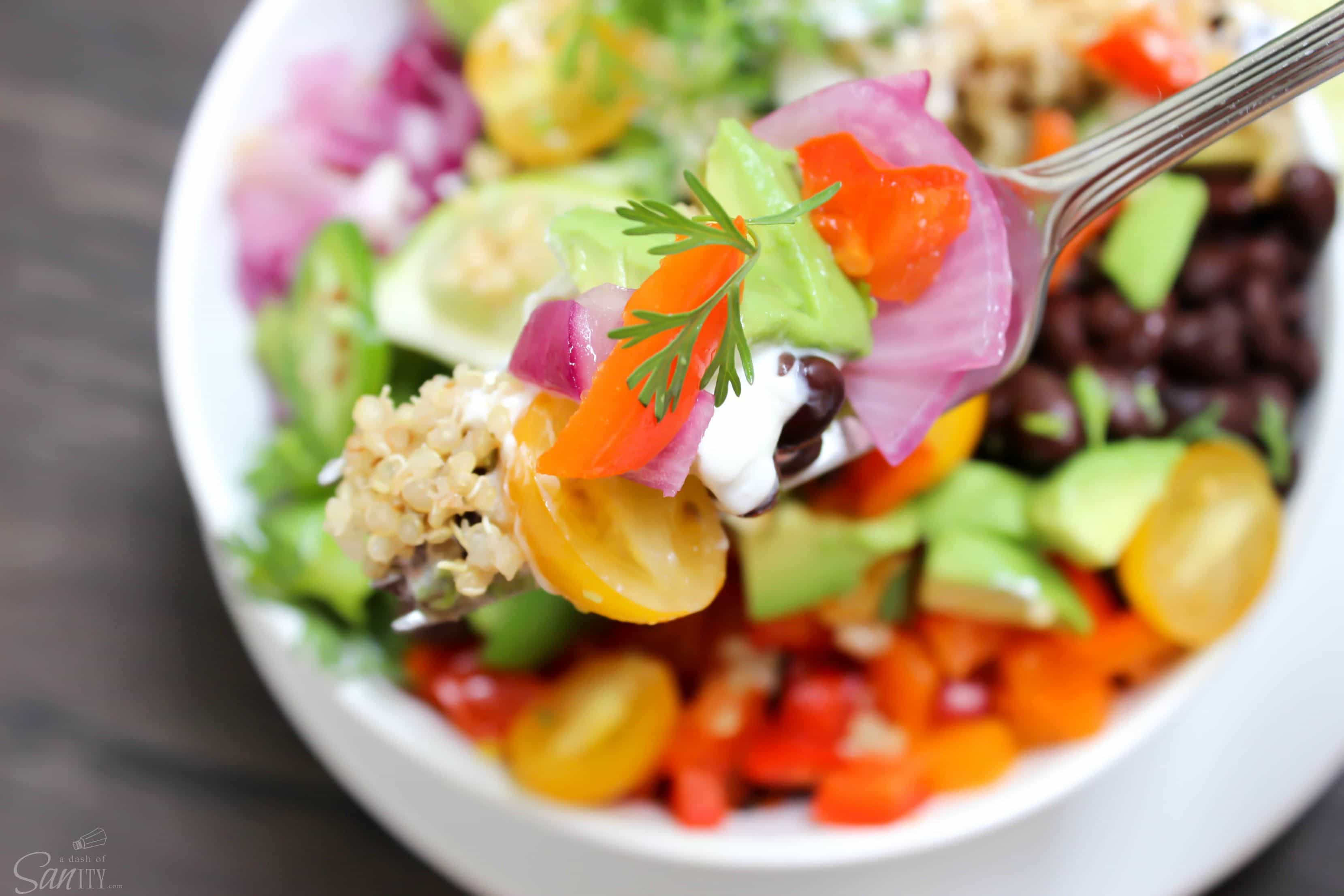 Fajita Quinoa Bowls with roasted peppers, onions, quinoa, plus all your favorite fixings for fajitas all in one bowl make one delicious meal.
