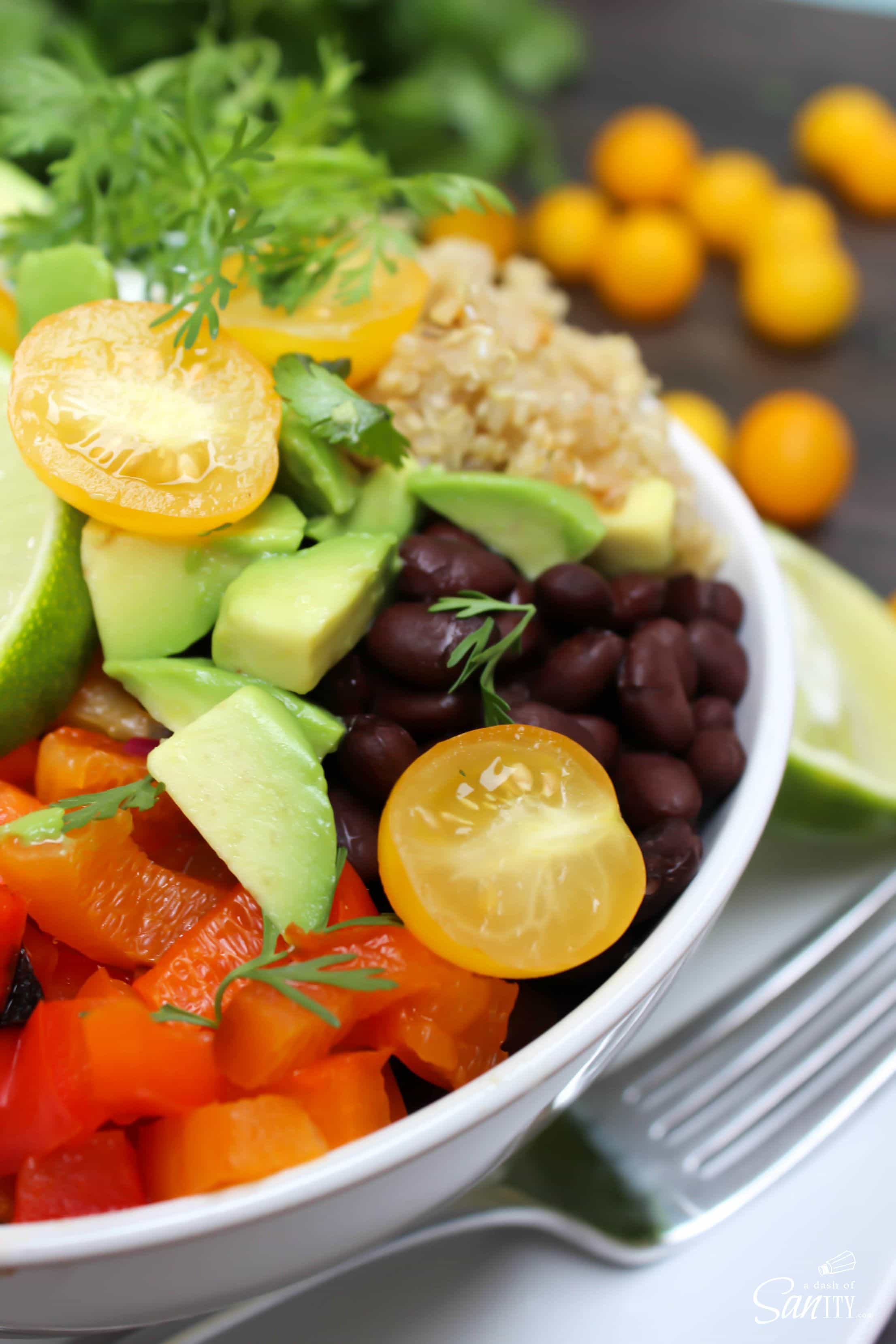 Fajita Quinoa Bowls with roasted peppers, onions, quinoa, plus all your favorite fixings for fajitas all in one bowl make one delicious meal.