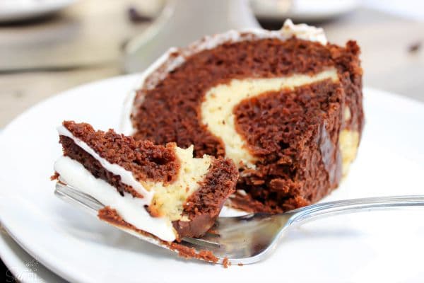 Chocolate Pumpkin Cream Cheese Swirl Cake is a gorgeous, rich, decadent pumpkin cake. A perfect center piece for your table that will be quickly devoured.