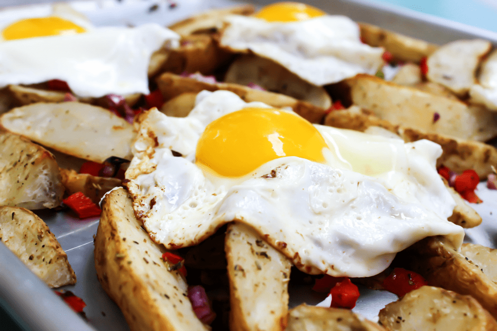 COLORADO BREAKFAST HASH flavorful, vibrant and easy, this super simple meal won’t be made just for breakfast but for lunch and dinner as well. breakfast hash potatoes on a sheet pan with fried eggs on top
