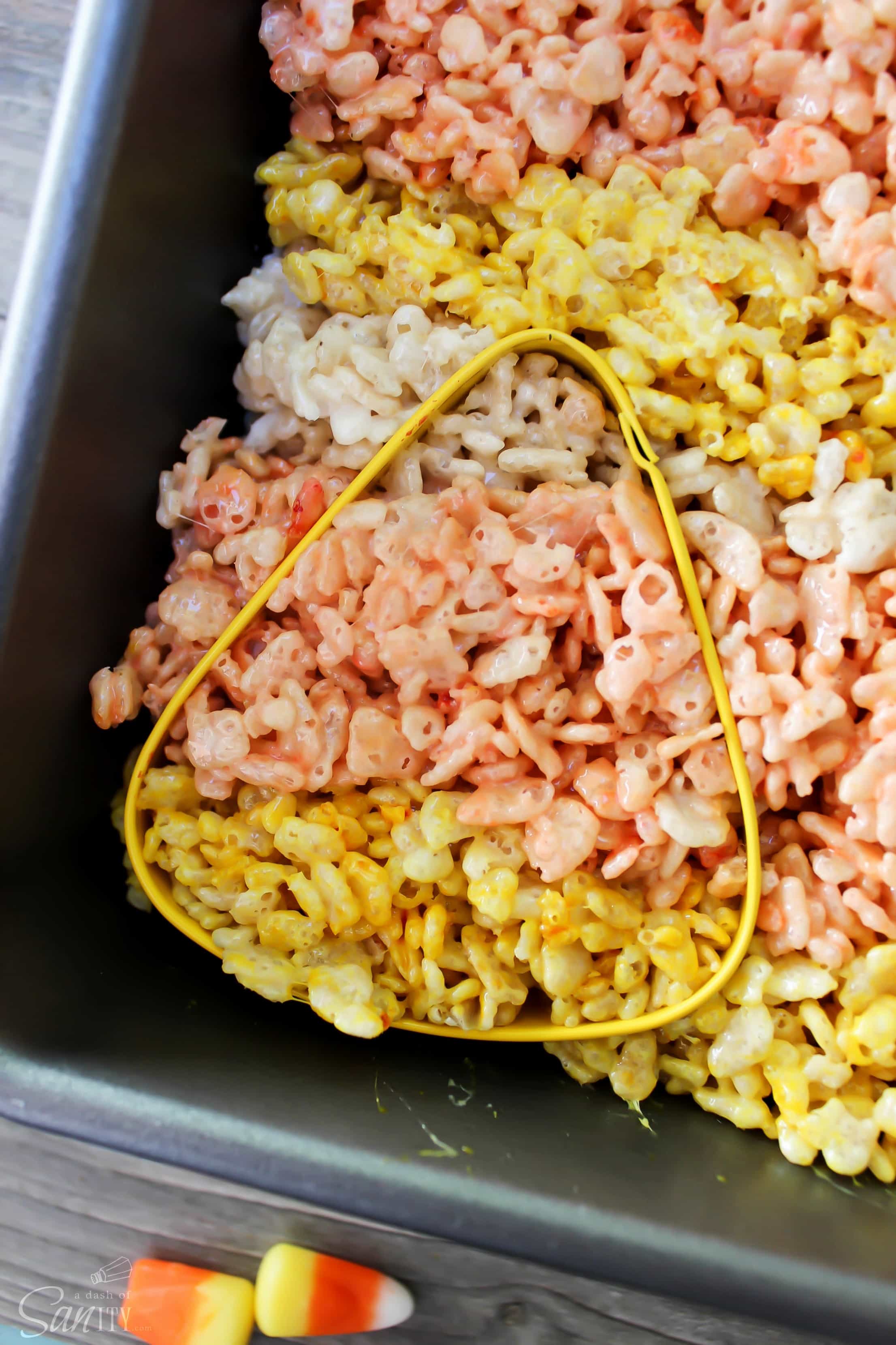 These Candy Corn Rice Krispies Treats are an easy to make, fun, and festive Halloween treat that everyone will enjoy this time of year. These Candy Corn Rice Krispies Treats are an easy to make, fun, and festive Halloween treat that everyone will enjoy this time of year.